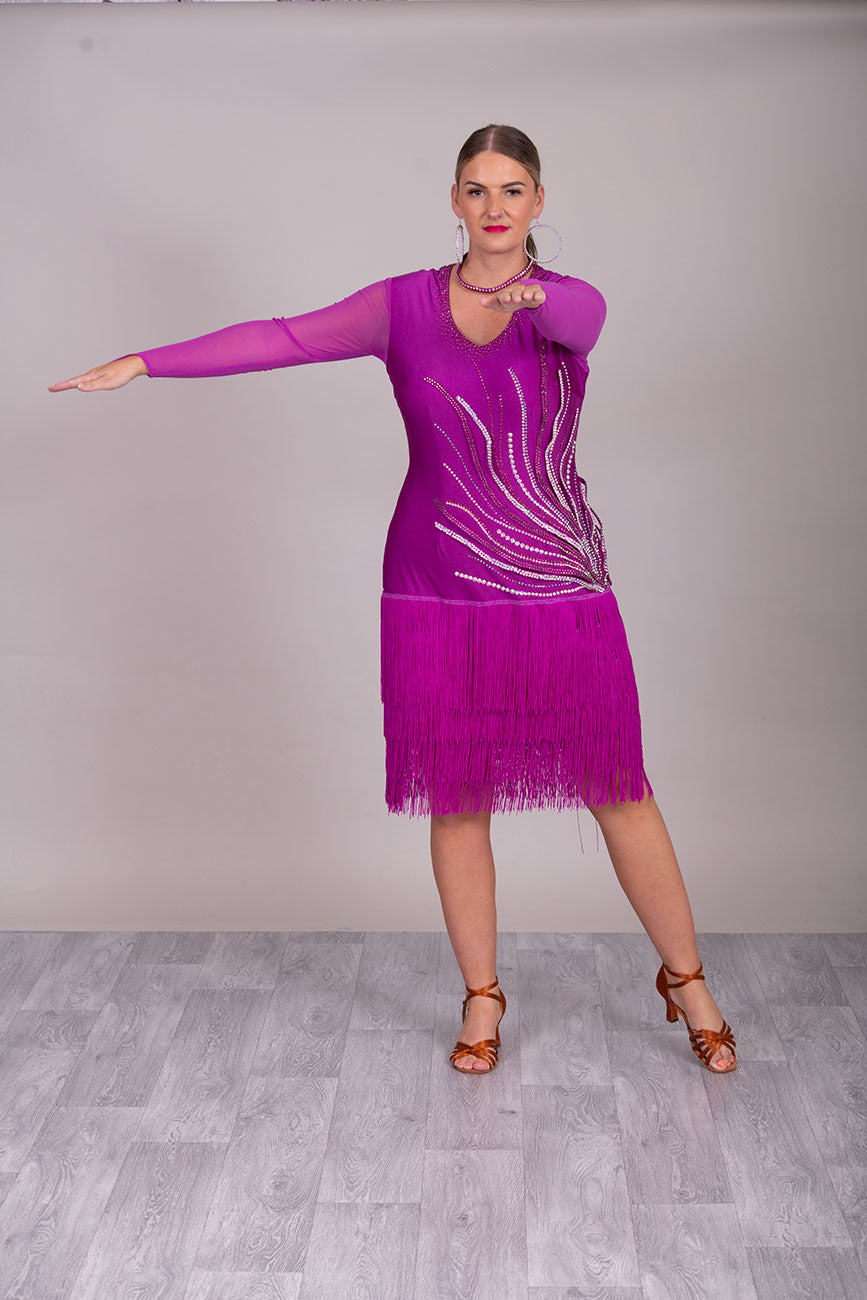 123L Hot Magenta Competition Latin Dance Dress. Flattering Hip Design with full back for option of wearing own Bra & full fringed skirts.