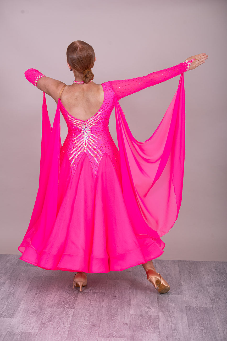41B TWD PETITE Bright Pink Competition Ballroom/Sequence Dress
Cold Shoulder to one side. Heavily Stoned in AB & Pink. ❤️Showroom Appointments Available❤️