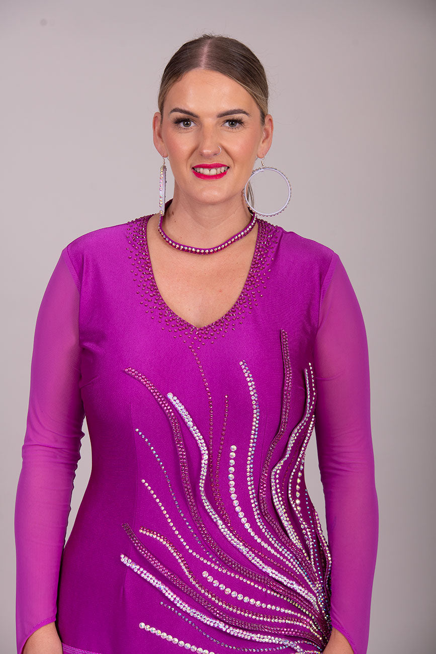 123L Hot Magenta Competition Latin Dance Dress. Flattering Hip Design with full back for option of wearing own Bra & full fringed skirts.