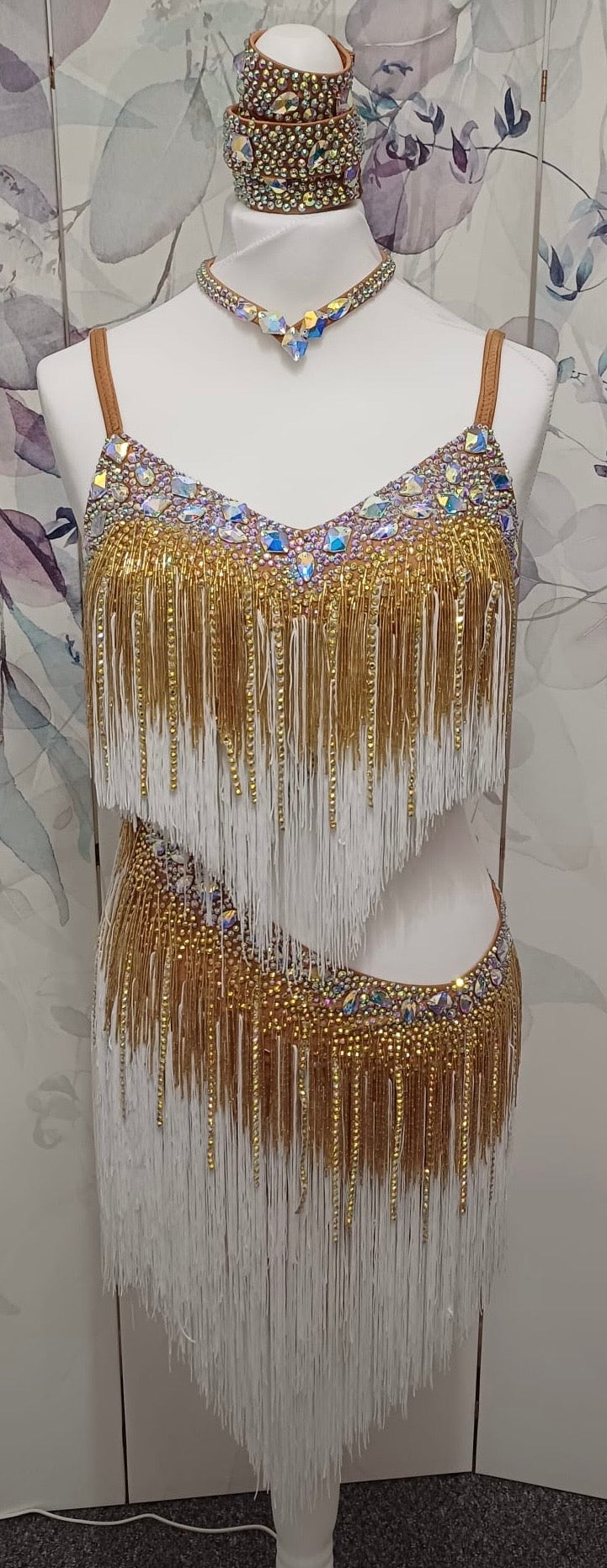 002 White & Gold full fringed Competition Latin Dance Dress. Heavily stoned with Gold & AB. Comes with Armbands & Bracelets. Very full fringes with stoned fabric strips added.