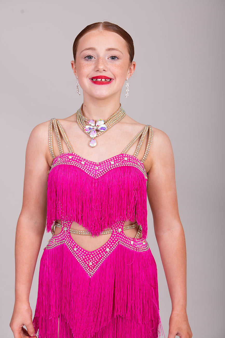(BUDGET)15Cerise Latin Competition Dance Dress.Full Fringed Skirts with shoulder & waist detailing. 2 Bangles included.                                     *****Our New Budget Range are Bought in ready made Costumes, with some detail added by TWDance*****