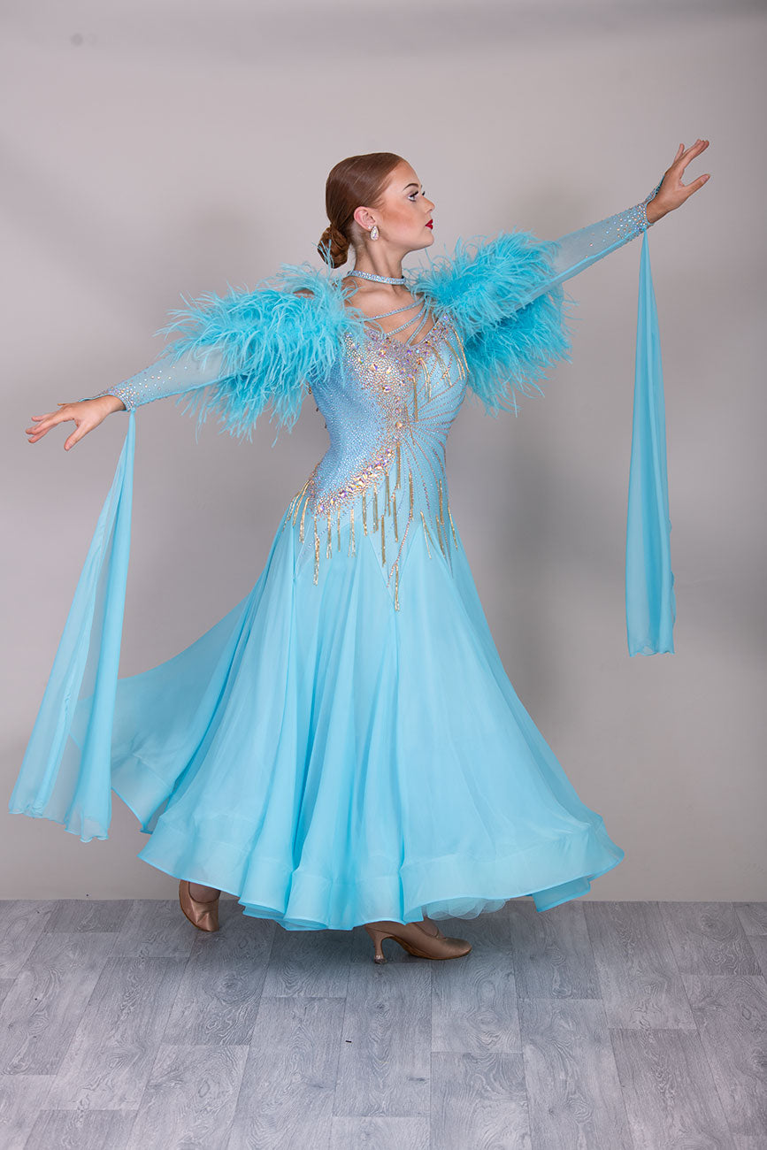 24B “TWD ELITE” New Full Skirts/Underskirts with Ostrich Feather sleeve detail. Stunning back design. Stoned in Crystal Golden Shadow with gold bead droppers. Detachable Floats