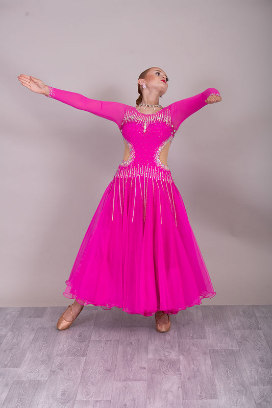 00002 Fuchsia Pink flesh side panel Ballroom Dress. AB stoned material droppers from the waist stoned with Ab throughout