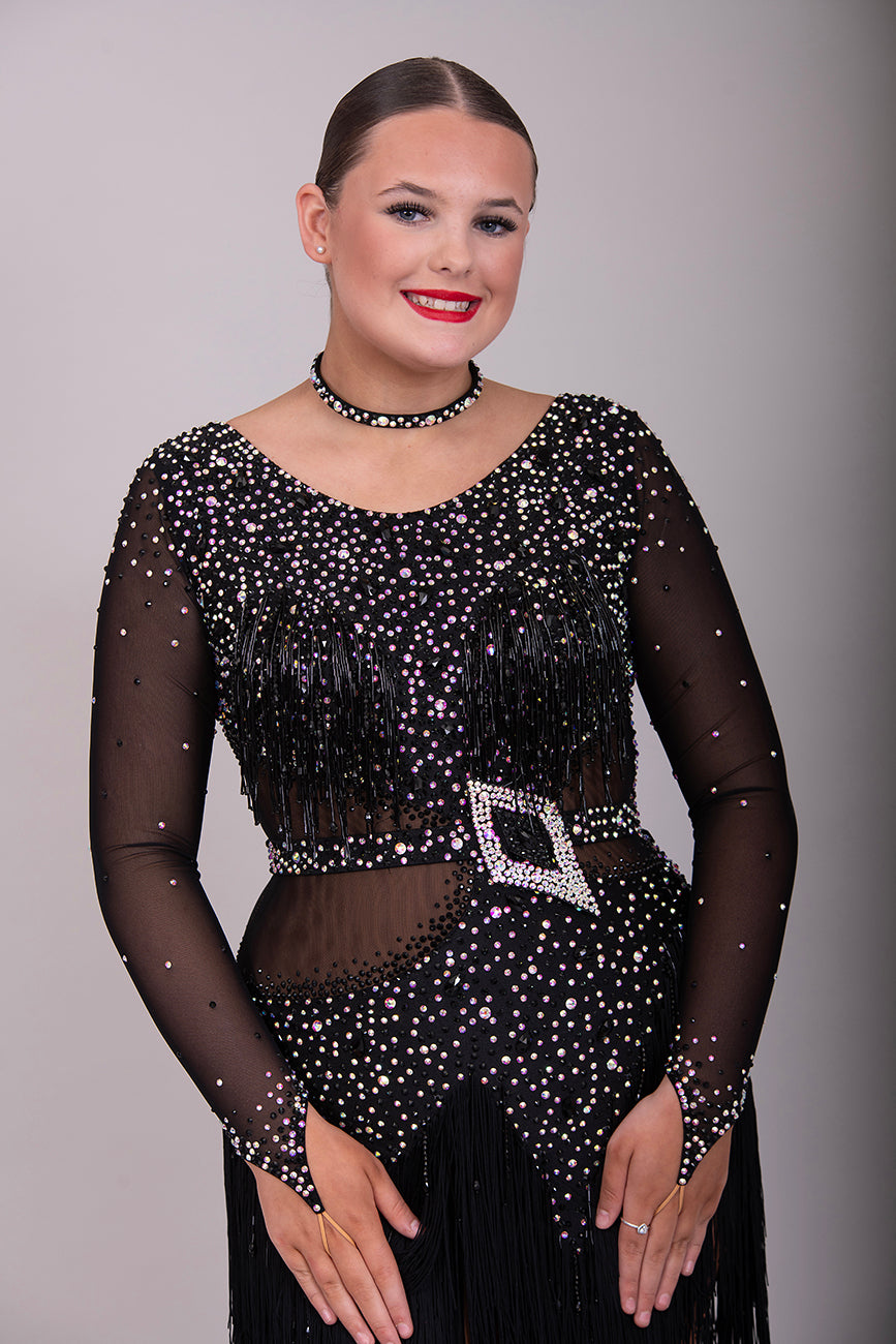 19L Black Latin/Rhythm Competition Dance Dress. Heavily stoned in black & AB with optional Belt. Bead droppers to the chest area and fringe shaped skirt