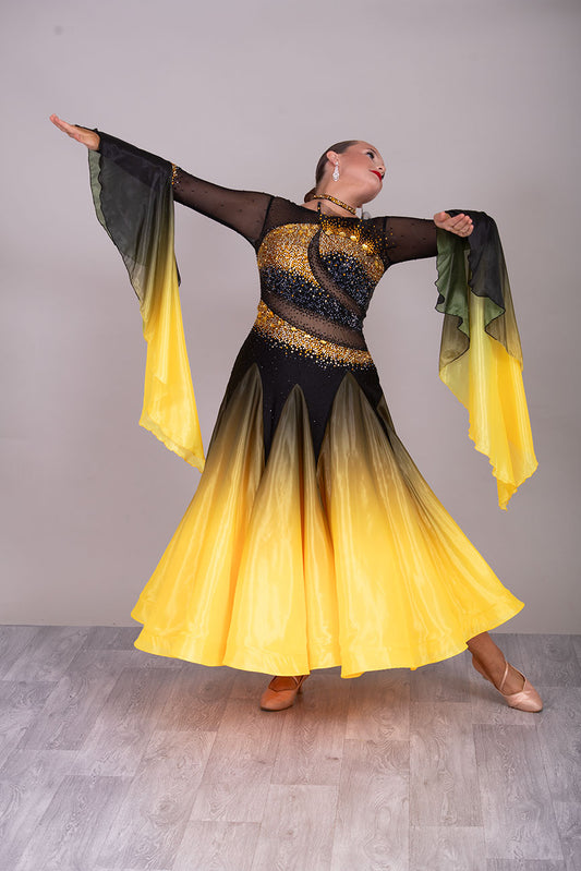 35B 
Striking Golden Yellow & Black Ombre Ballroom/Sequence Competition Dance Dress. Ombre pearl chiffon stoned in topaz & black. Feature bell style sleeves that can have finger loop attached to keep in place. 

❤️Showroom Appointment Available❤️