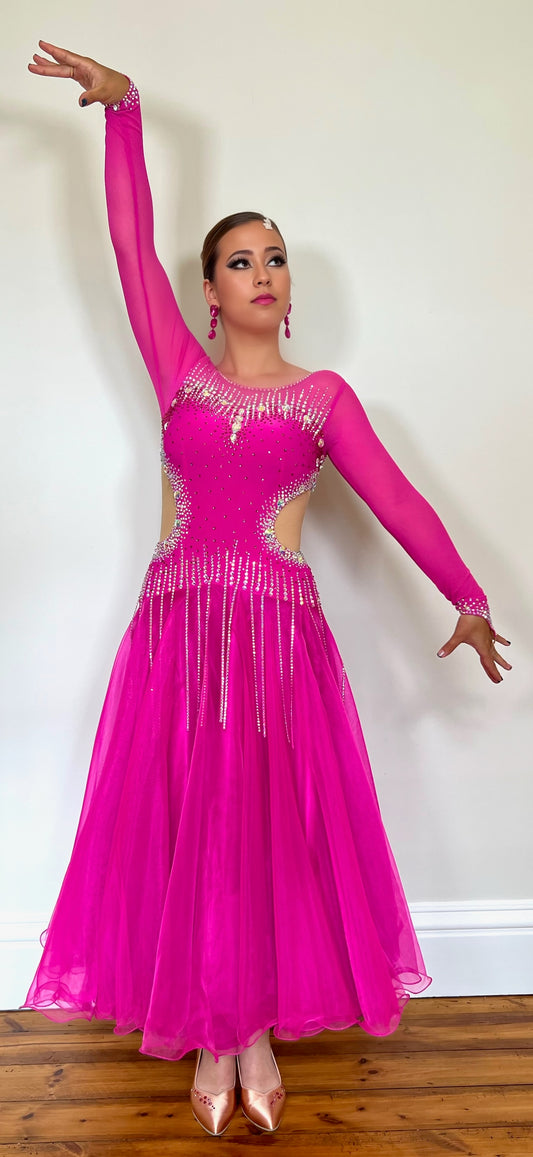 00002 Fuchsia Pink flesh side panel Ballroom Dress. AB stoned material droppers from the waist stoned with Ab throughout