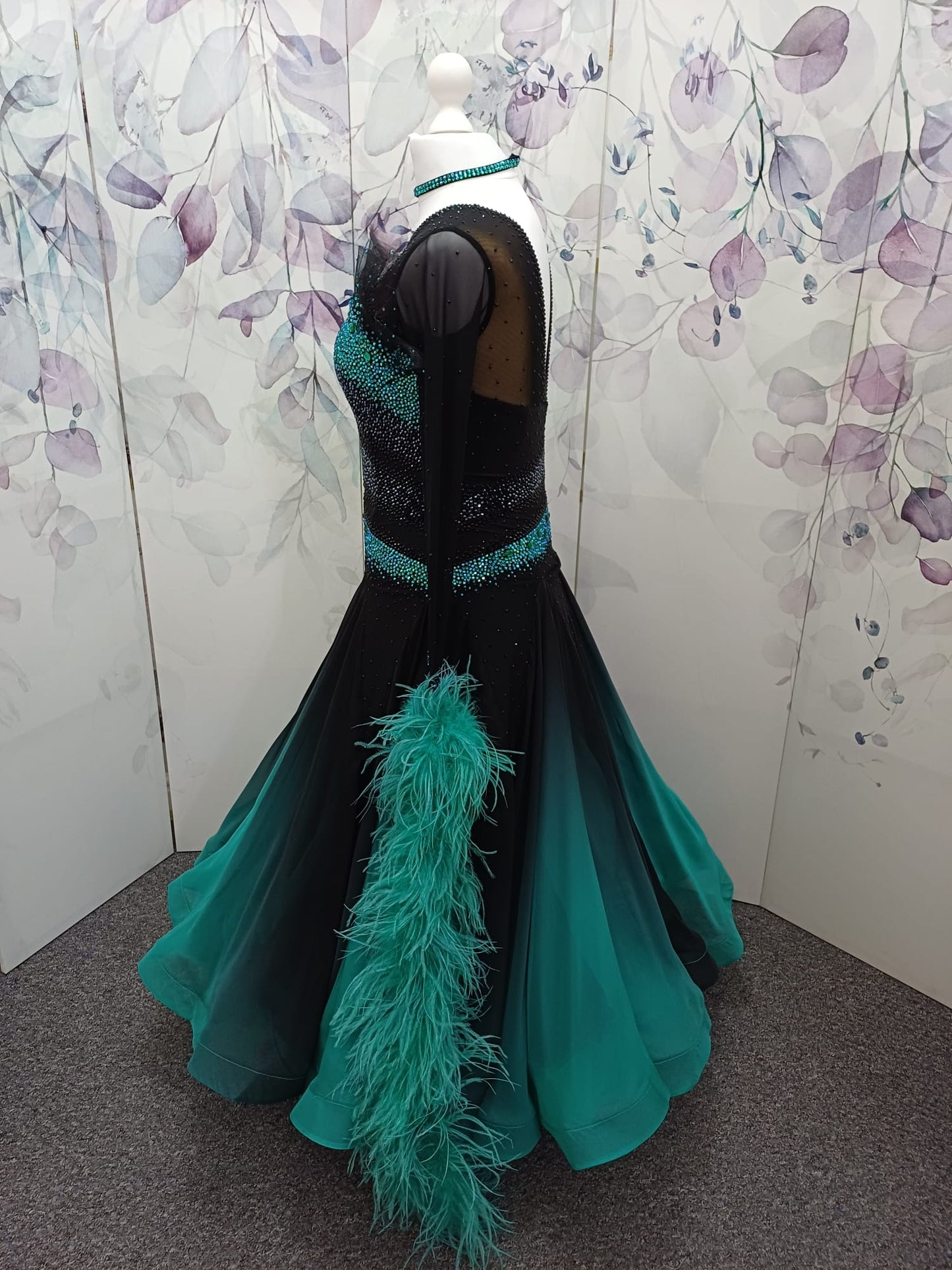 70B Stunning Black & Blue Zircon Competition Ballroom Dance Dress. Heavily stoned in Blue Zircon & jet with detachable Ostrich boa floats. ❤️Showroom Appointments Available❤️