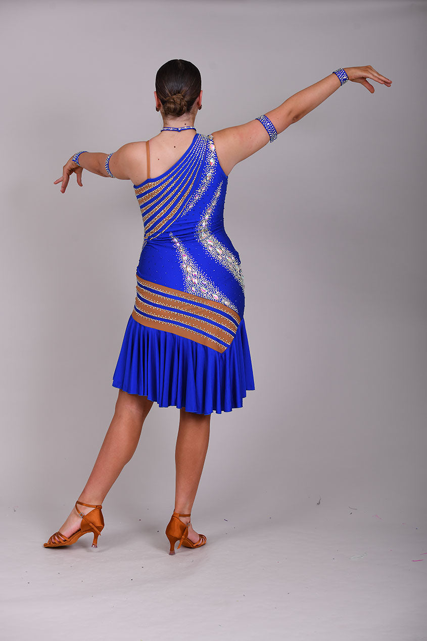 138 Bright Electric Blue One Shoulder Latin Dress. Tan Lycra to one side & heavily stoned in AB. Full frill effect skirt.