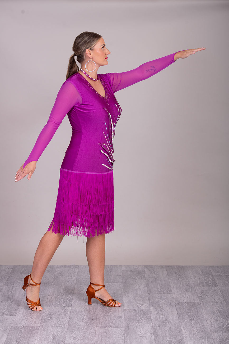 123L Hot Magenta Competition Latin Dance Dress. Flattering Hip Design with full back for option of wearing own Bra & full fringed skirts.