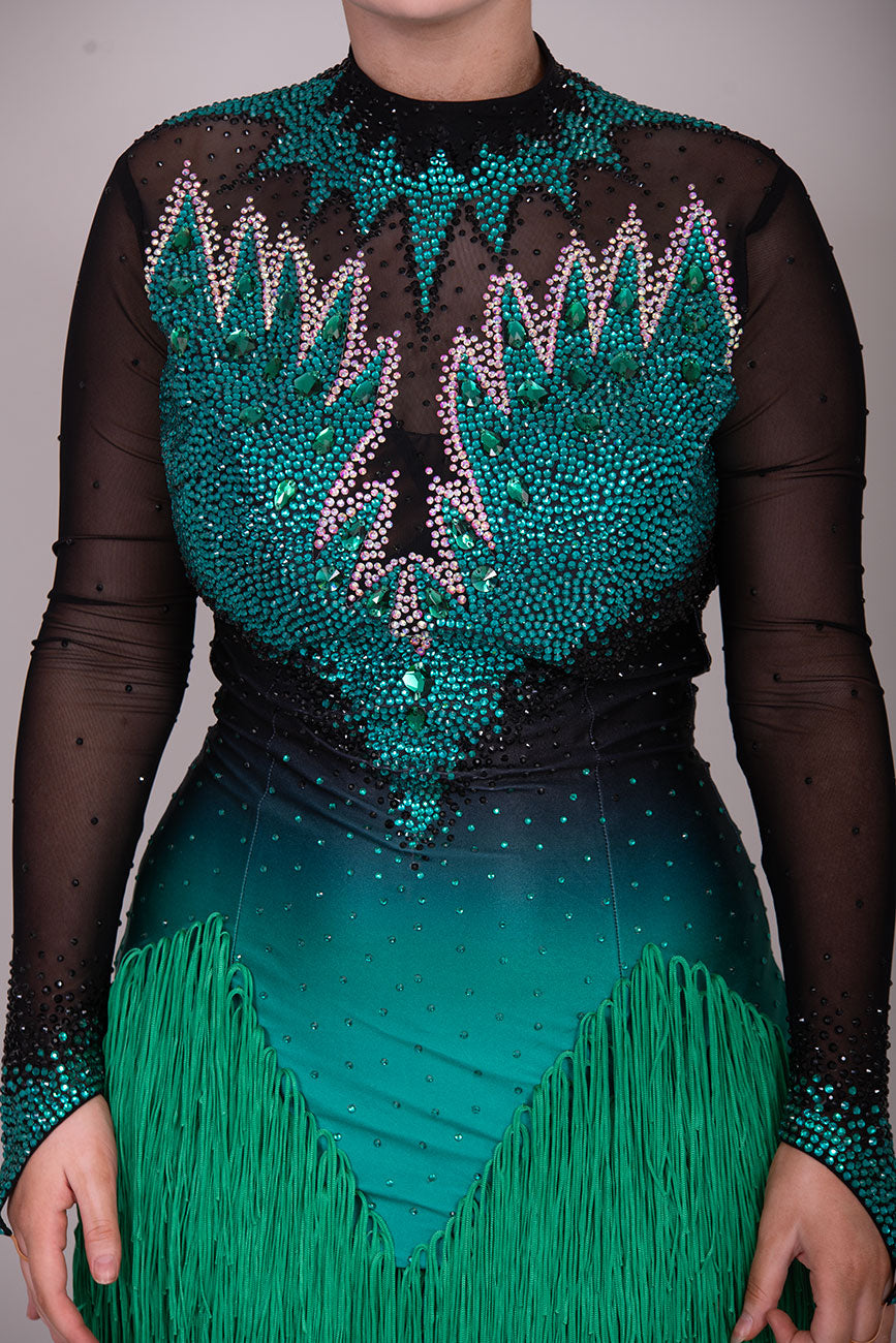 118L TWD ELITE LATIN Competition Latin Dance Dress. Striking Design to front & Back with Ombre Green & Black Lycra Bodice. Full fringed skirts for maximum movement.