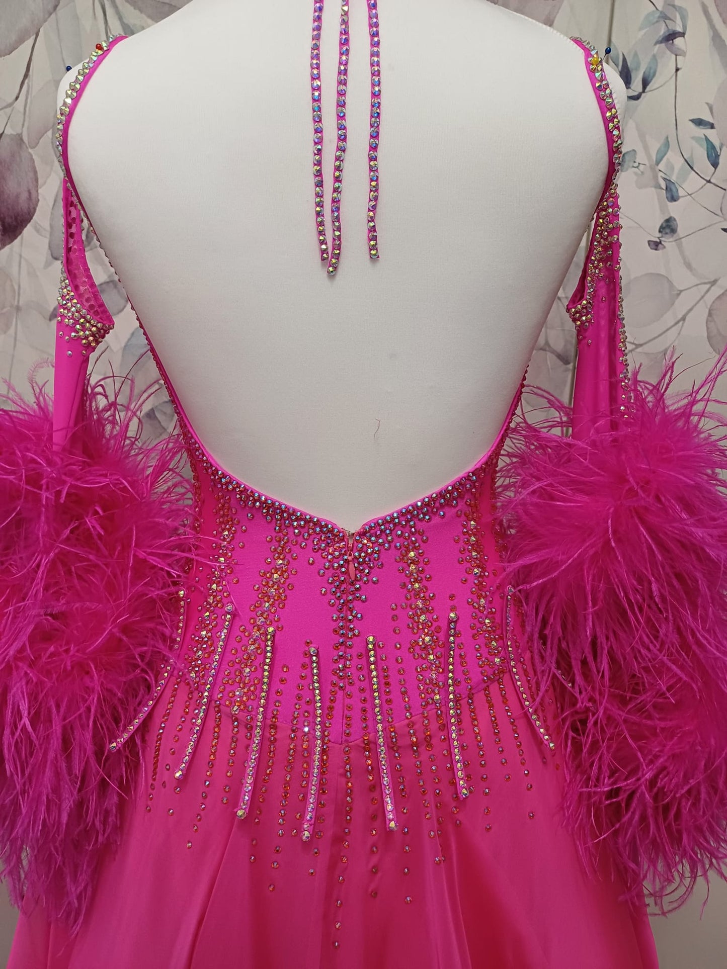 006 Cerise Pink Competition Ballroom/Sequence Dance dress. Comes with Gloves, Floats & Ostrich feathers. Stoned in AB, Rose & Rose AB. 3D detail to the waste.