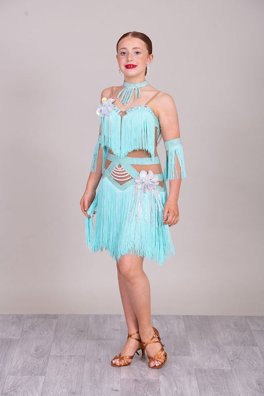 (BUDGET)8 Icey Blue Latin Competition Dance Dress. stoned AB & pearls. Flower to chest & hip, fringe skirts.                                           *****Our New Budget Range are Bought in ready made Costumes, with some detail added by TWDance*****