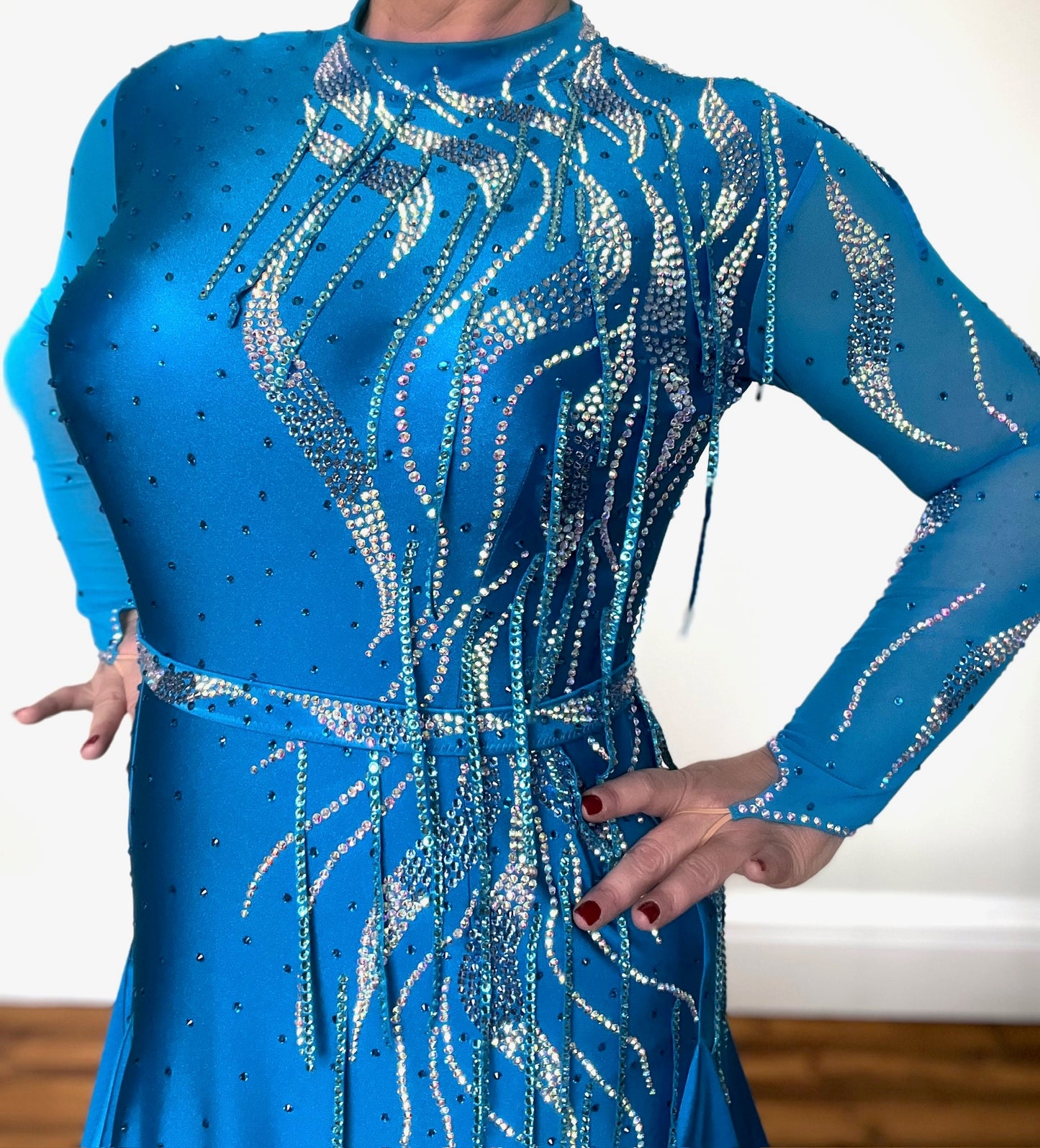 0017 Turquoise Blue Competition Latin Dress. Stoned with Light Sapphire, Aquamarine & AB. Comes with optional belt.