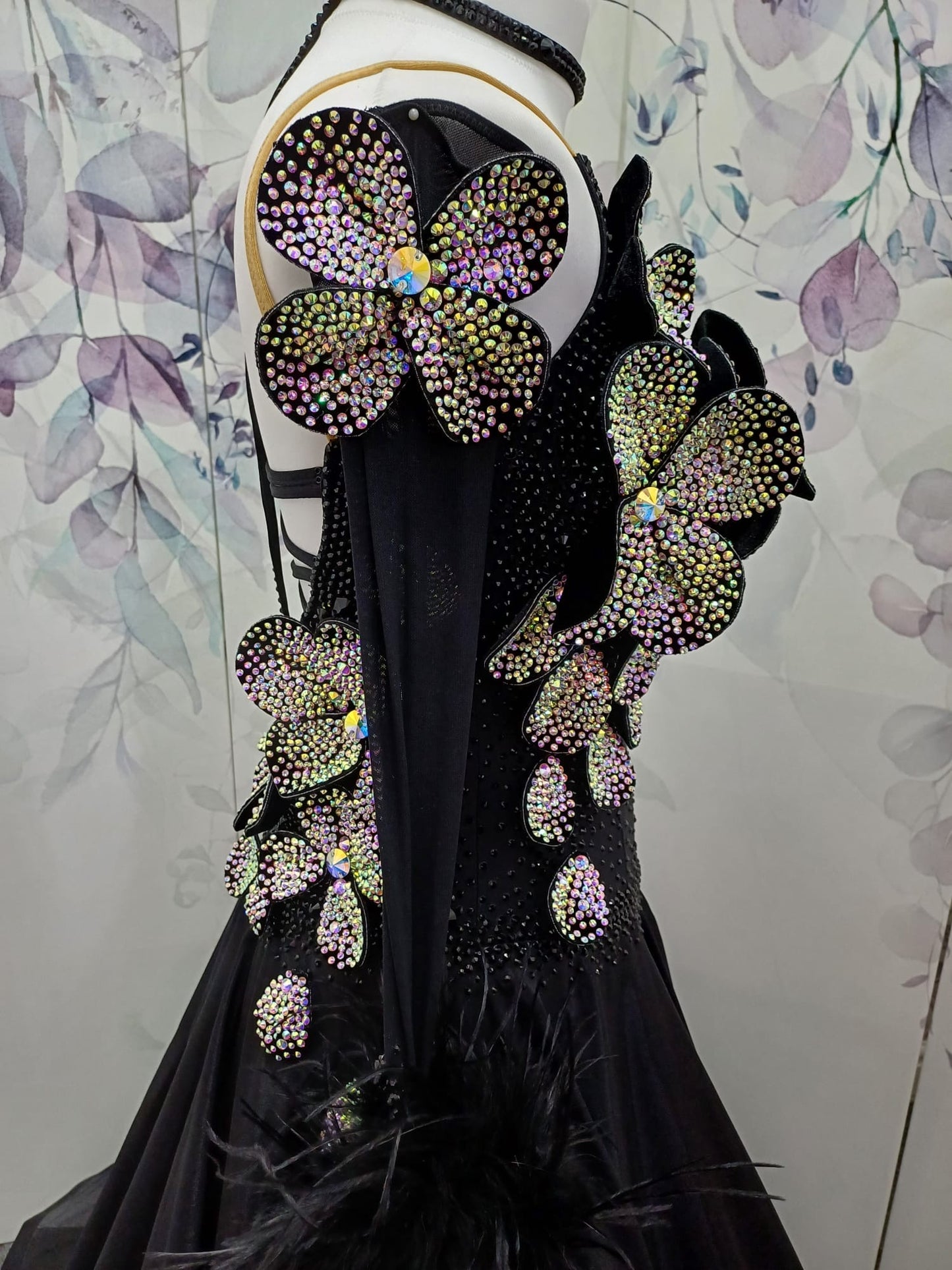 57B TWD “ELITE” Striking Black Ballroom/Sequence Competition Dance Dress. 3D Flowers heavily stoned in AB with Jet stoning throughout. Detachable Ostrich Feather Floats & Long Gloves ❤️Showroom Appointments Available❤️