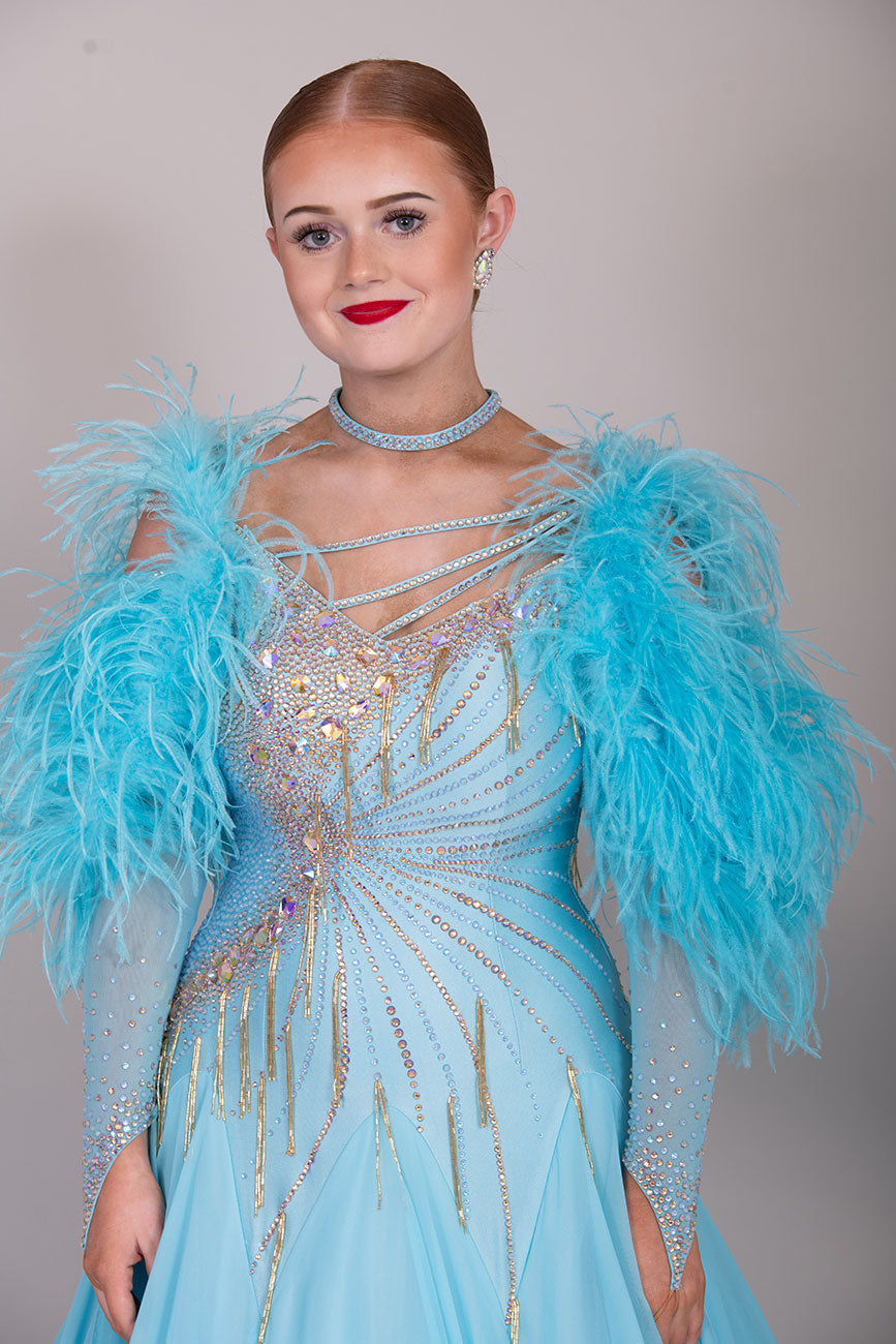 24B “TWD ELITE” New Full Skirts/Underskirts with Ostrich Feather sleeve detail. Stunning back design. Stoned in Crystal Golden Shadow with gold bead droppers. Detachable Floats