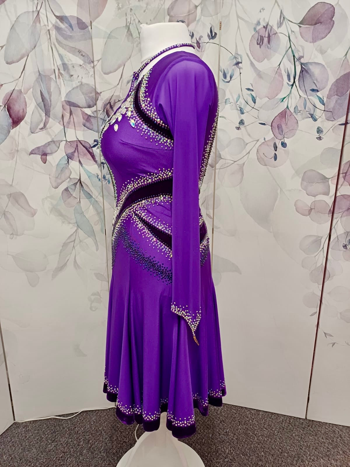 041 Cadbury Purple Competition Latin Dance Dress. Deep purple contrast pattern heavily stoned in AB & Amethyst AB. Bold & Flattering design. Full skirt giving maximum movement.