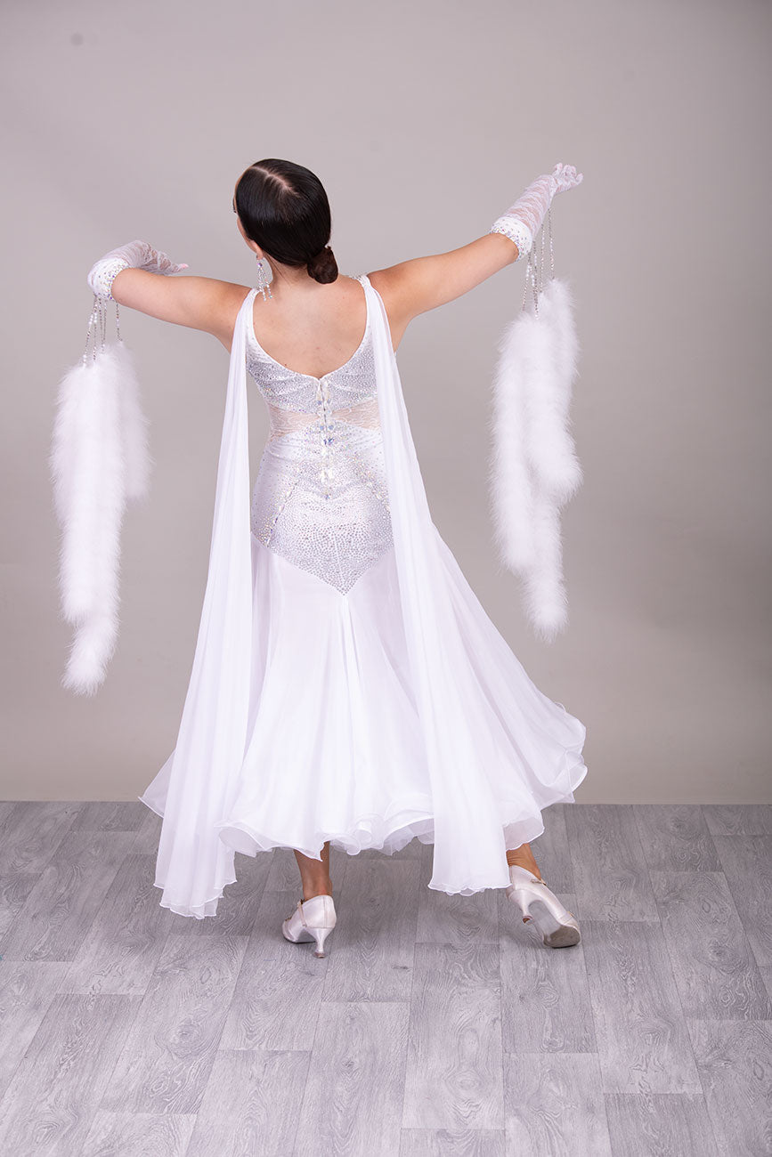 52B TWD “PETITE” Feminine in White with Lace hip inserts Competition Ballroom Dance Dress. Lovely lace Design detail to the upper Bodice. Stoning in AB. Marabou Boa Floats     ❤️Showroom Appointments Available❤️