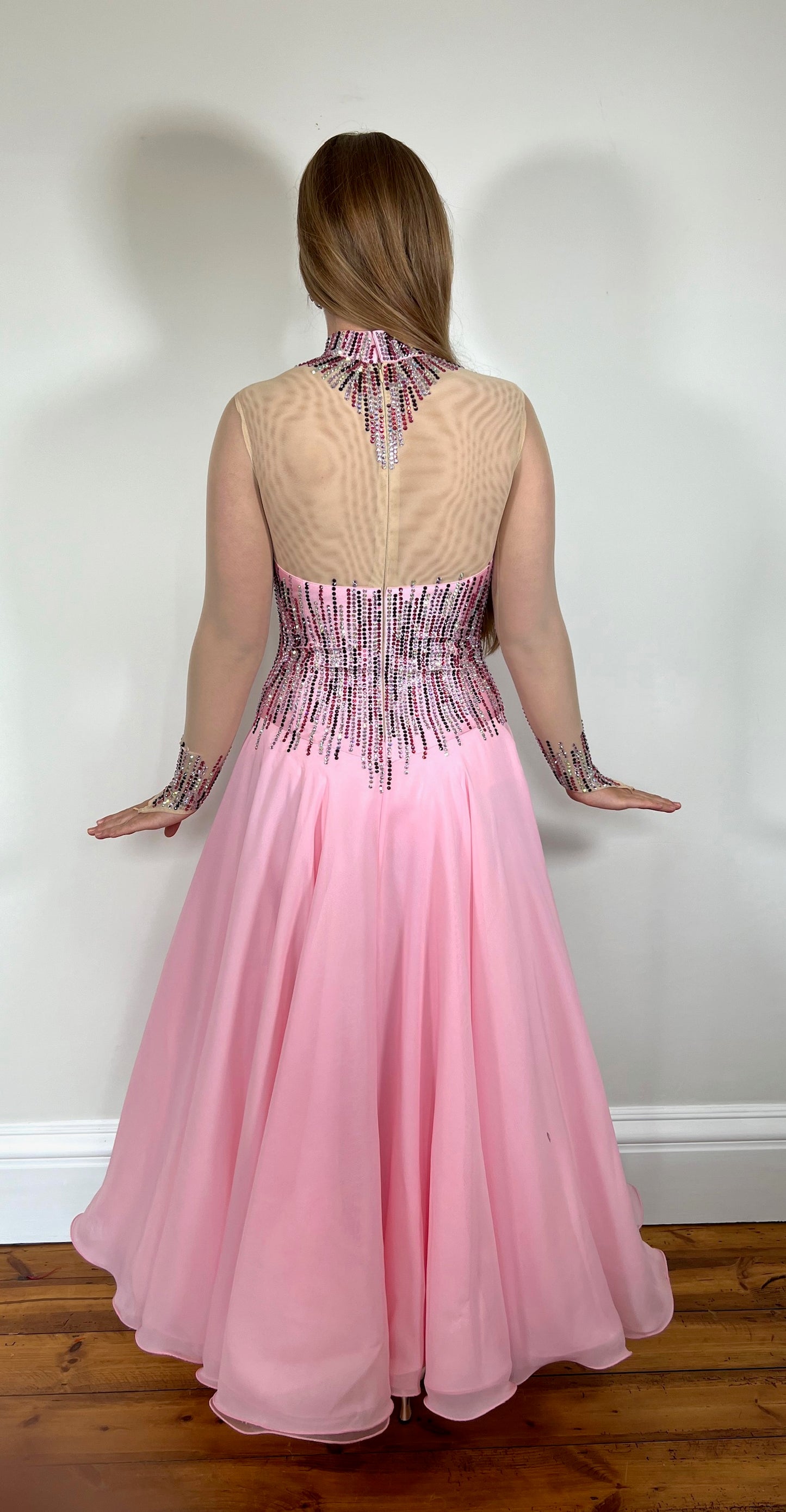 029 Baby Pink High Neck Ballroom Dress decorated with amethyst, Rose, light rose & AB stones. Stoned necklace decoration to the neck with high back detail.