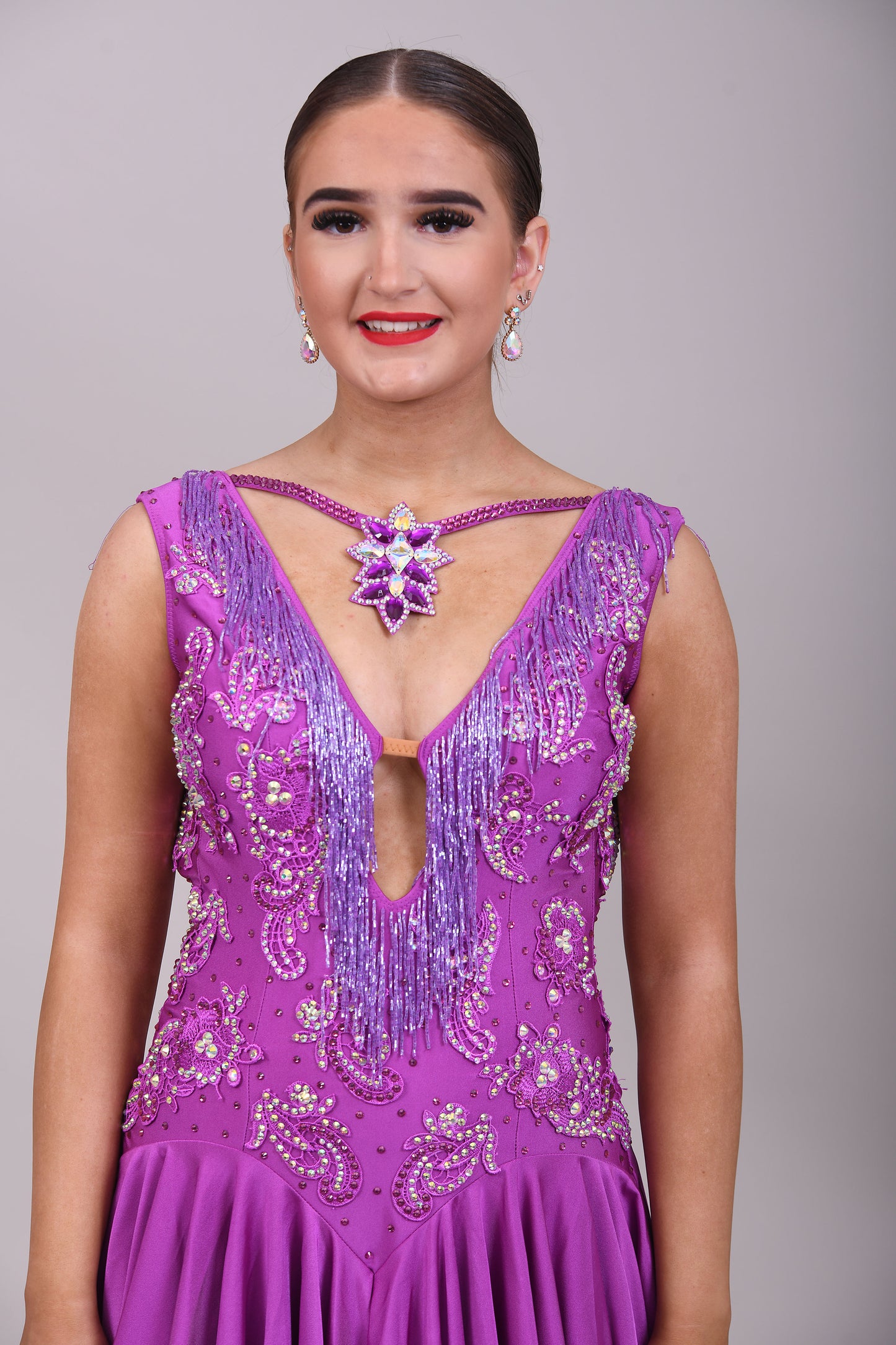 090 Hot Magenta Latin Dress. Lilac bead droppers with hot magenta appliqué stoned in AB. Necklace detail to front with open back