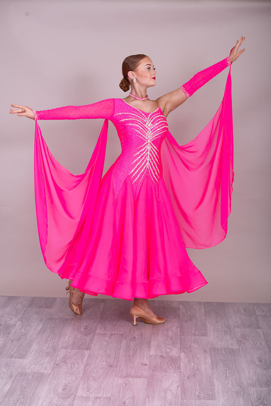 41B TWD PETITE Bright Pink Competition Ballroom/Sequence Dress
Cold Shoulder to one side. Heavily Stoned in AB & Pink. ❤️Showroom Appointments Available❤️