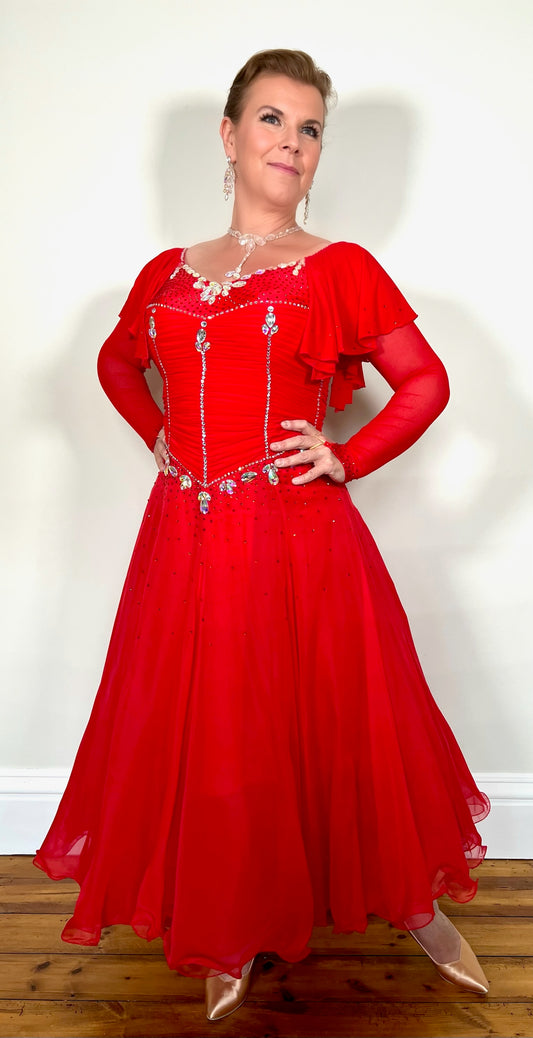 340 Red Rouched Bodice Ballroom Dress. Frill detail to top of sleeve with detachable ribbon floats. Detailed necklace. Decorated in Siam and AB stones.