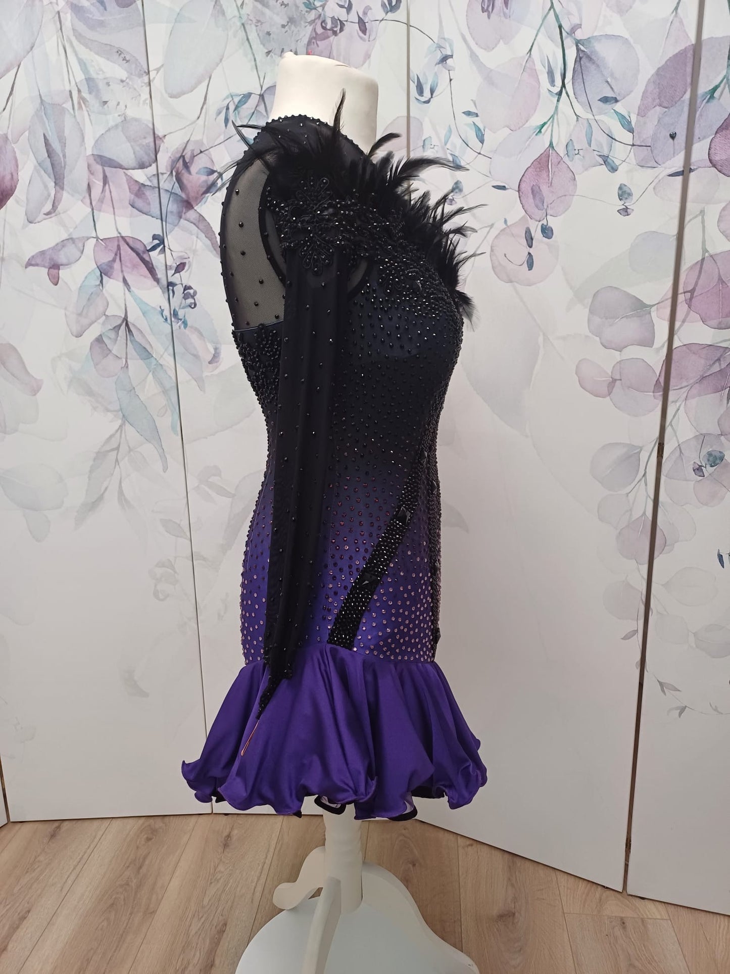 194 Standout Latin Dance Dress. Black to purple ombre with full frill skirt. Decorated with ostrich feather trim, purple & jet stones.