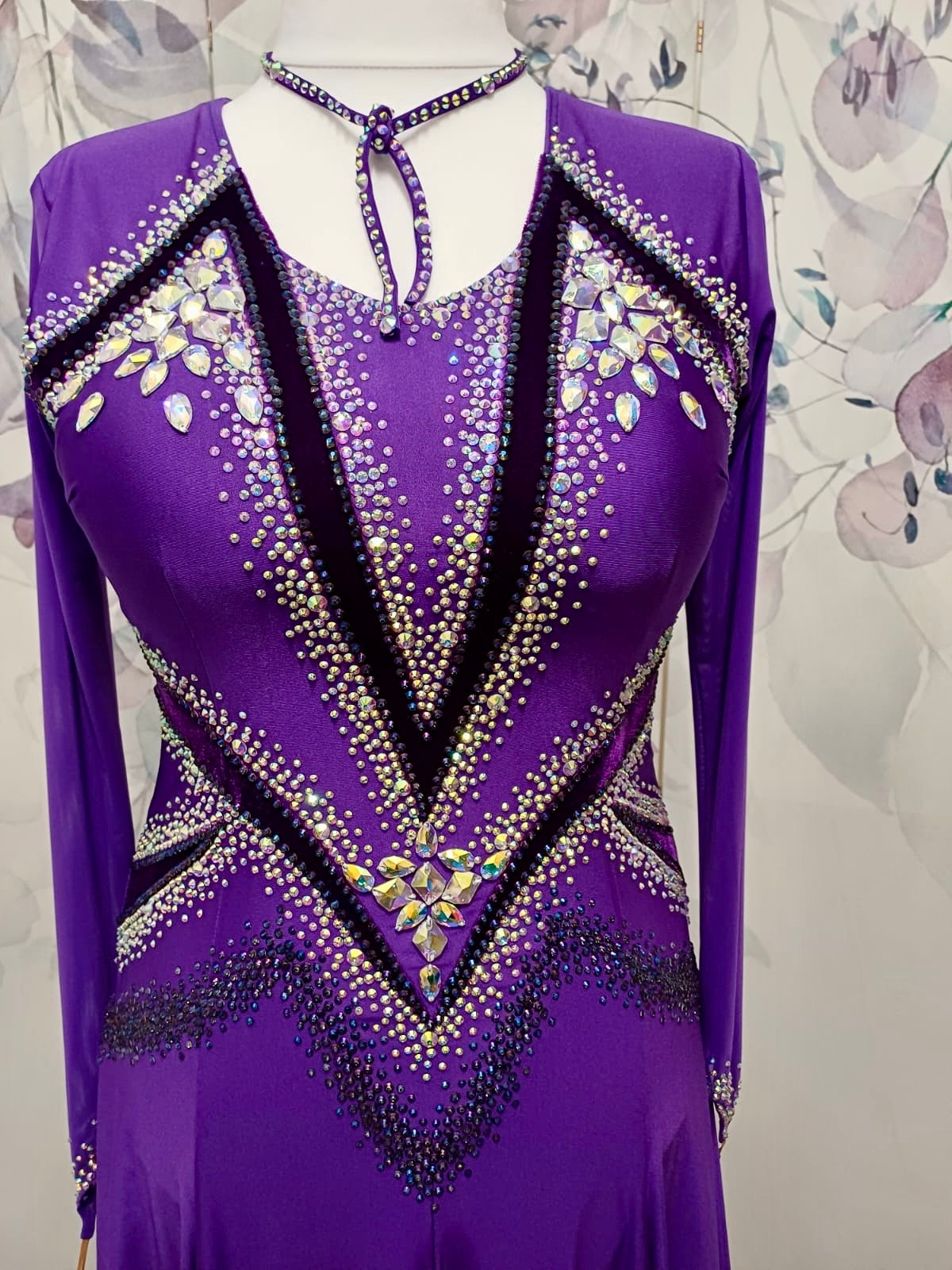 041 Cadbury Purple Competition Latin Dance Dress. Deep purple contrast pattern heavily stoned in AB & Amethyst AB. Bold & Flattering design. Full skirt giving maximum movement.