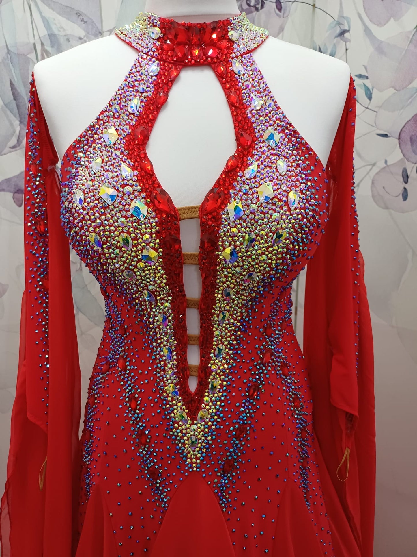 61B Bright Red Competition Ballroom/Sequence Dance Dress. Open detailing to the centre front, heavily stoned in Light Siam, AB & Siam AB. Beautiful Key hoke detail at neck. ❤️Showroom Appointments Available❤️