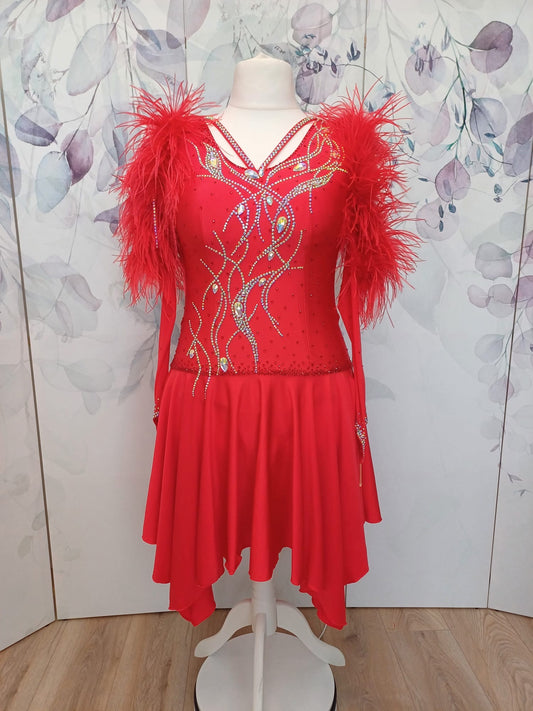 301 Rich Red Competition Latin Dance Dress. Ostrich boa decoration to the upper arm with stoned strap detail. Very full skirt. Stoned in Light Siam & AB