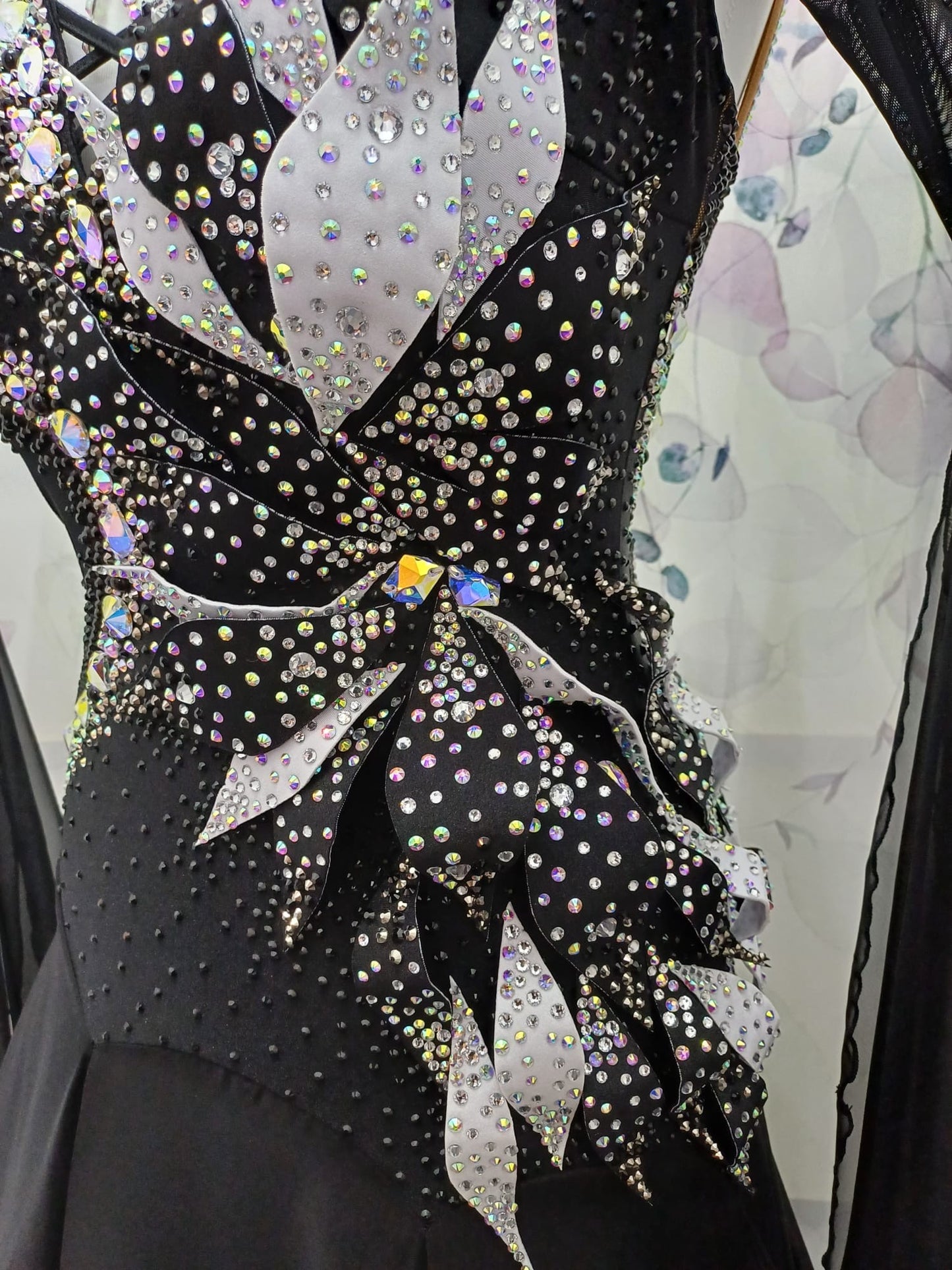 58B Gorgeous Black Ballroom/Sequence Competition Dance Dress. 3D Design to right side of bodice. Heavily stoned in jet & AB. ❤️Showroom Appointments Available ❤️