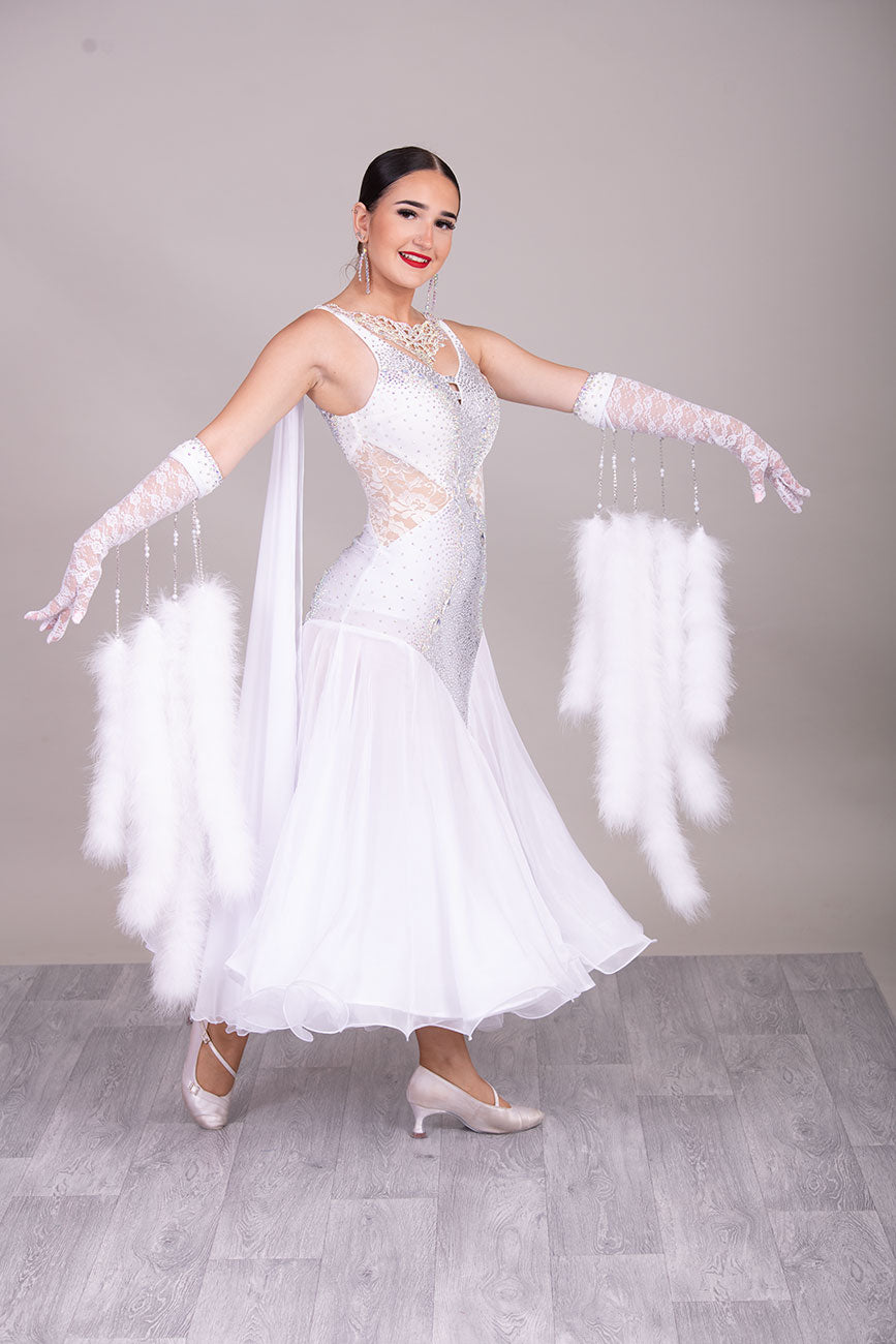 52B TWD “PETITE” Feminine in White with Lace hip inserts Competition Ballroom Dance Dress. Lovely lace Design detail to the upper Bodice. Stoning in AB. Marabou Boa Floats     ❤️Showroom Appointments Available❤️