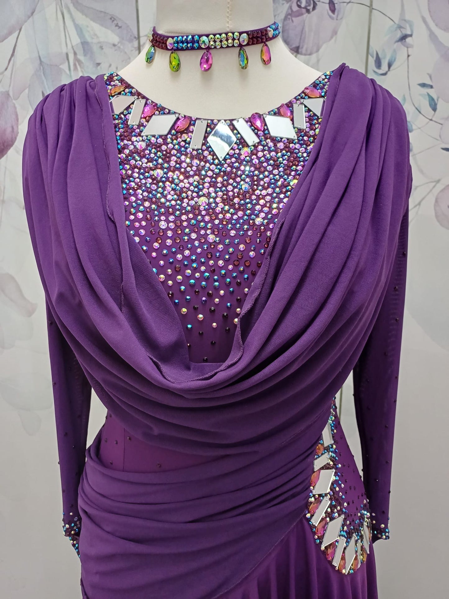 66L Plum Competition Latin Dance Dress. Heavily stoned with AB, Amethyst & Amethyst AB with mirrors. Sash detail to front, back & hip. Could be removed. High back to wear own Bra. ❤️Showroom Appointments Available❤️