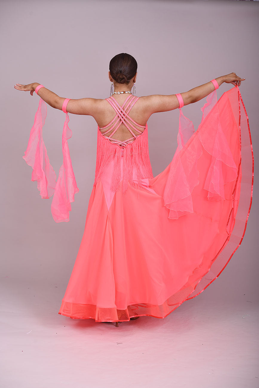 237 Bright Coral Fringed Dress. Decorated in AB stones with strapping detail to the shoulders & back. Matching Skirt, Floats & Belt available on request £135 extra