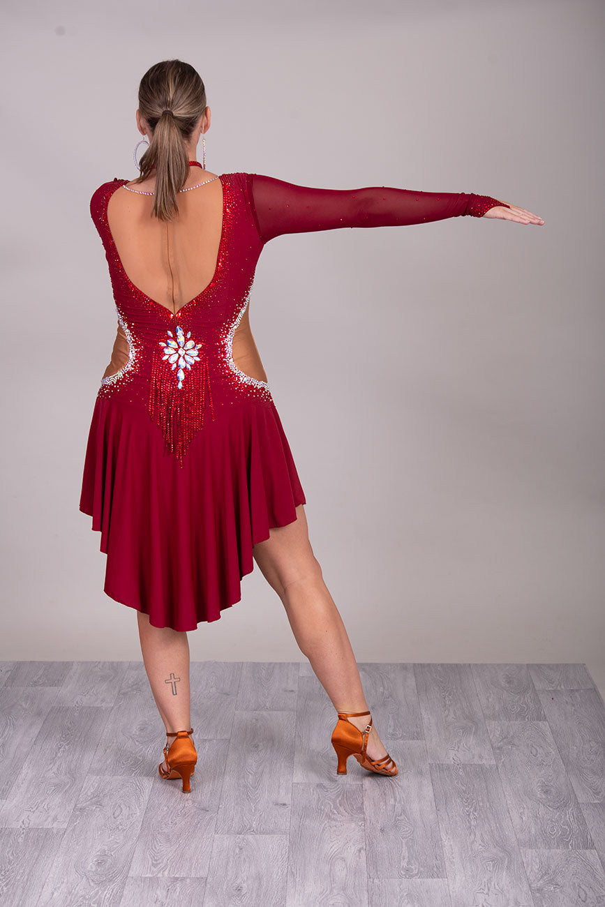 052 Wine Colour Latin Competition Dance Dress with heavily stoned stunning design in AB & Dark Siam High Mesh Back to give option of wearing own Bra. Flesh colour Lycra side panels (not see through) giving the illusion of cut outs.