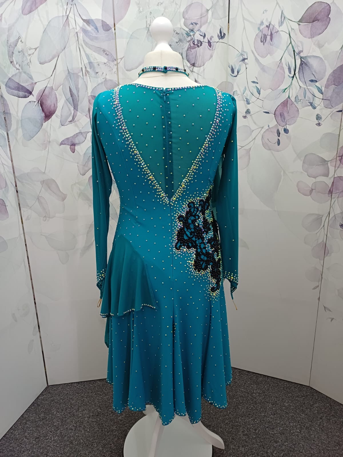60L Teal Competition Latin Dance Dress. Beautiful Teal colour. Black pearls & AB stones with overlay detail to the chest & Back hip giving flattering lines. ❤️Showroom Appointments Available❤️
