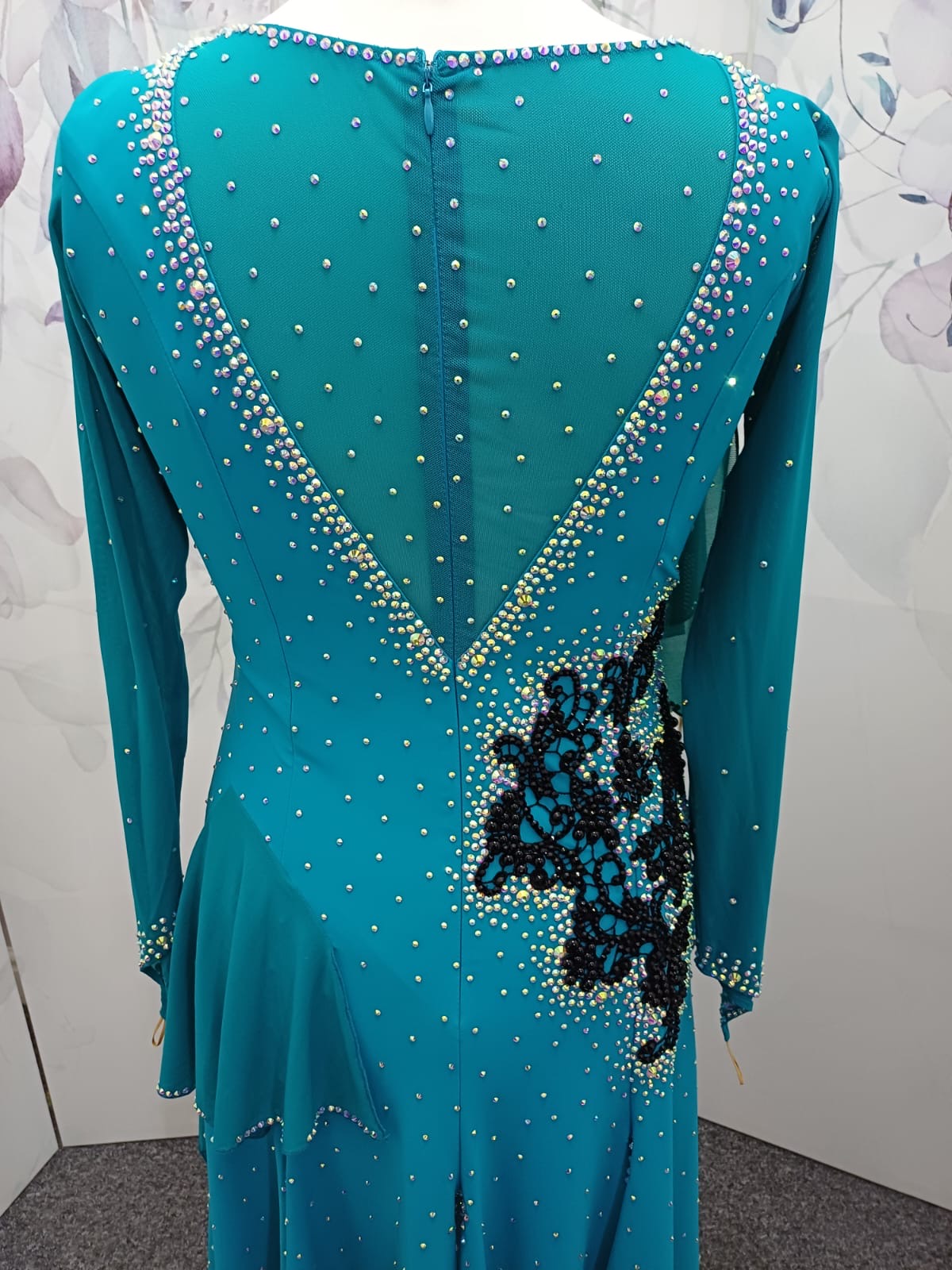 60L Teal Competition Latin Dance Dress. Beautiful Teal colour. Black pearls & AB stones with overlay detail to the chest & Back hip giving flattering lines. ❤️Showroom Appointments Available❤️