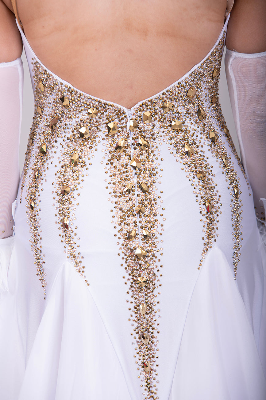 012 Stand out White & Gold Competition Ballroom Dance Dress. 3D design to the Bodice heavily stoned in Gold Ore & Golden Shadow. Detachable Floats with Ostrich feather cuffs.