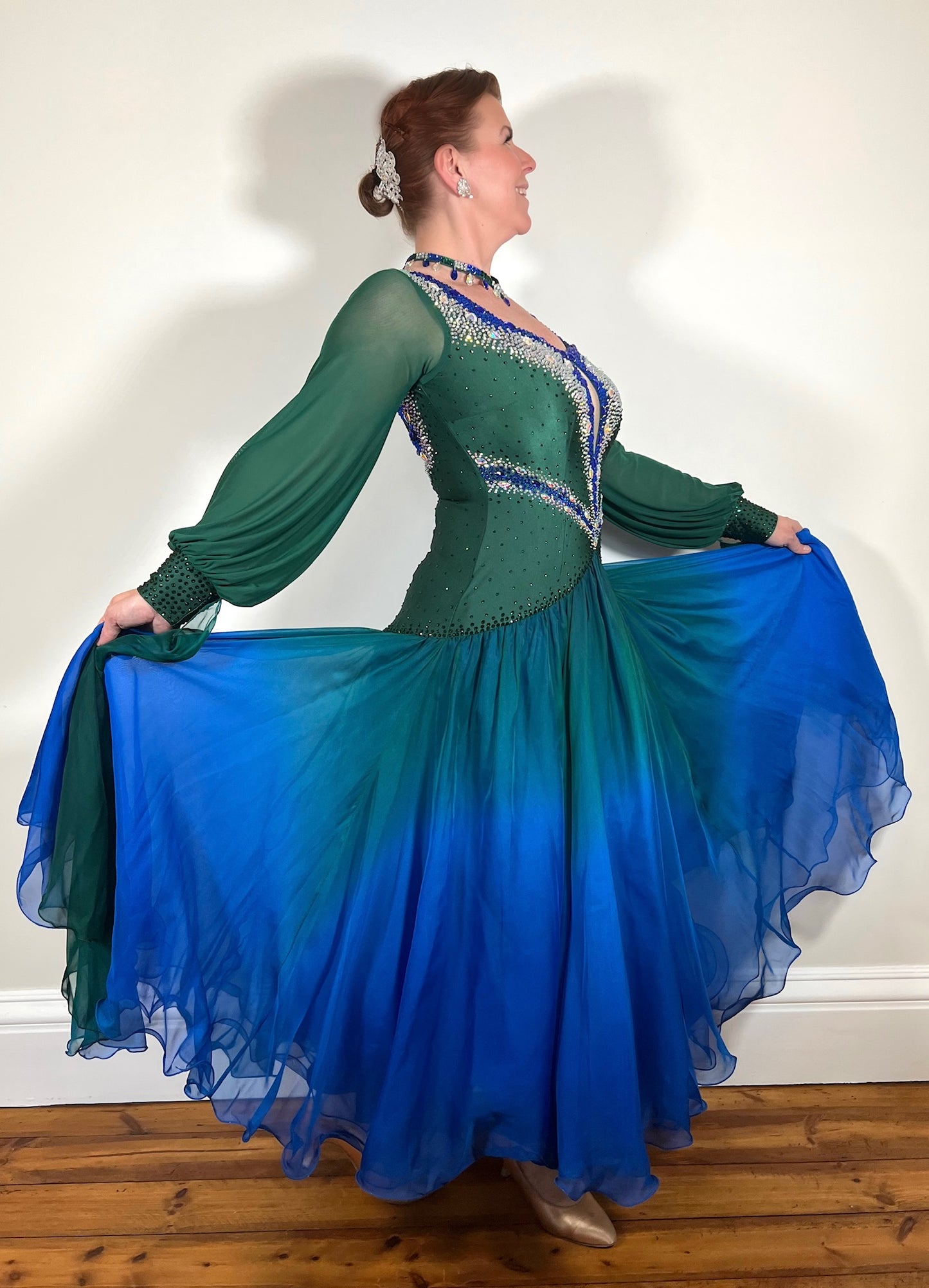 0005 Royal Blue & Forest Green Ombre Ballroom Dress. Detailed high back with shape detailing to the front. Detachable floats to the wrist. Stoned with Emerald, Sapphire & AB