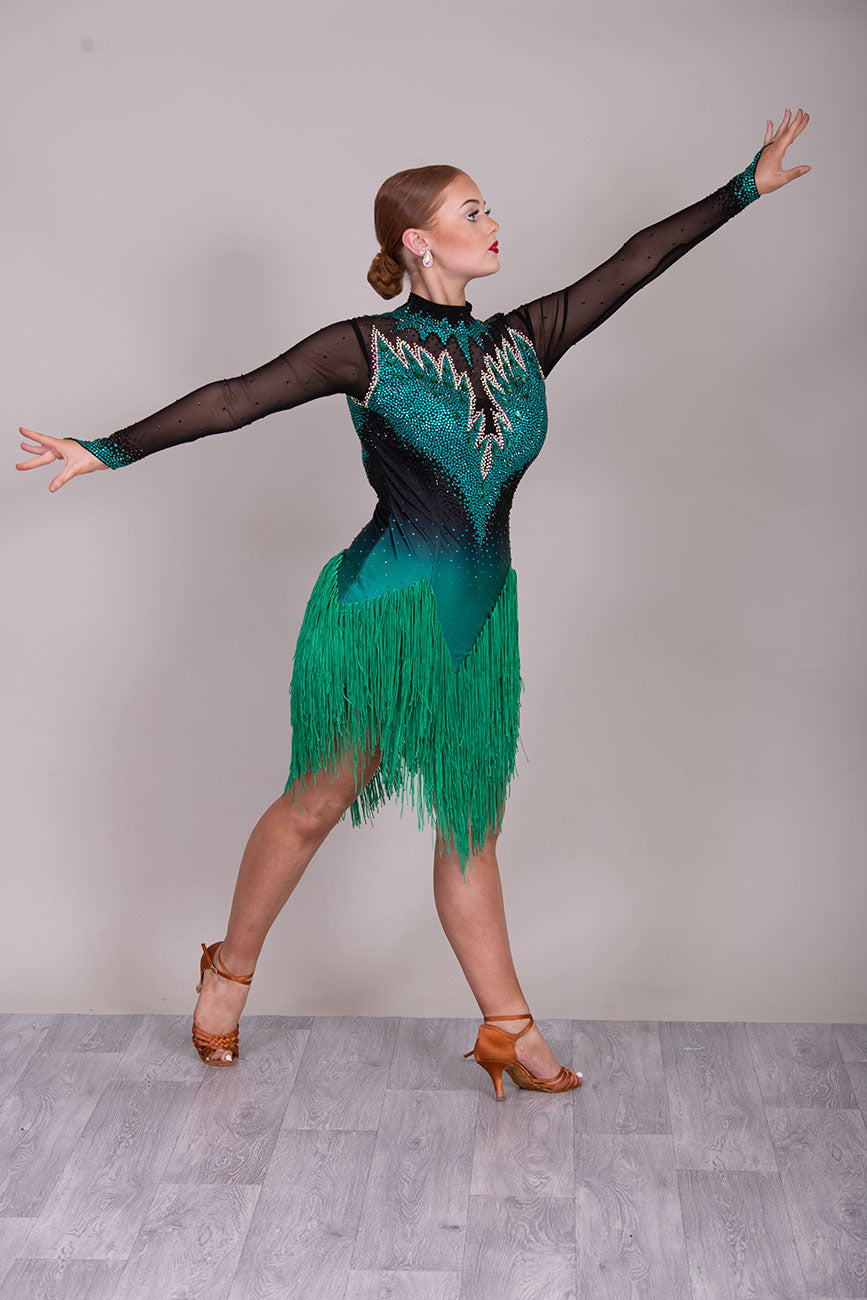 118L TWD ELITE LATIN Competition Latin Dance Dress. Striking Design to front & Back with Ombre Green & Black Lycra Bodice. Full fringed skirts for maximum movement.