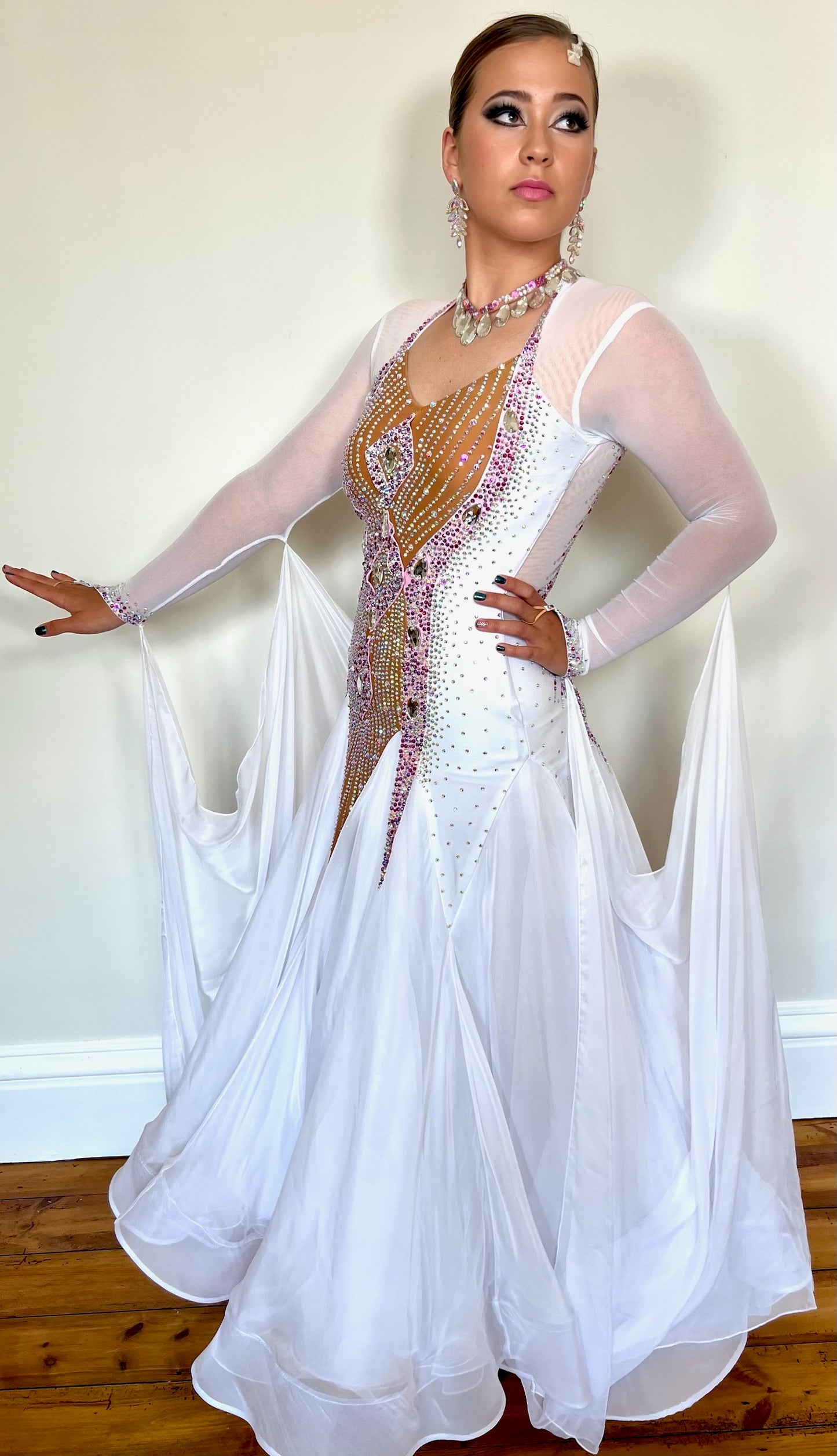 247 White and Tan Ballroom Dress. Stunning decoration stoned in AB & light rose. Floats to sleeves & back.