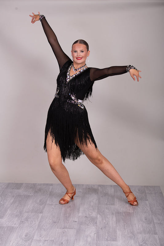 124L Latin Competition Dance Dress
High Back with option of wearing own Bra. Very full fringe to the chest & skirt. Stoned in jet & AB