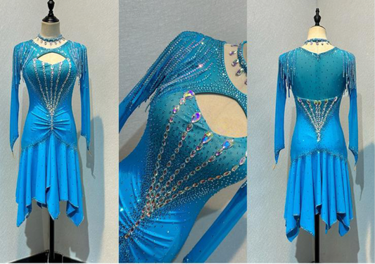 130L Turquoise Blue Competition Latin Dance Dress. High back giving option to wear own Bra. Hip rouched & corset style detail to upper chest. Stoned in AB & Light Sapphire. ❤️Showroom Appointments Available❤️