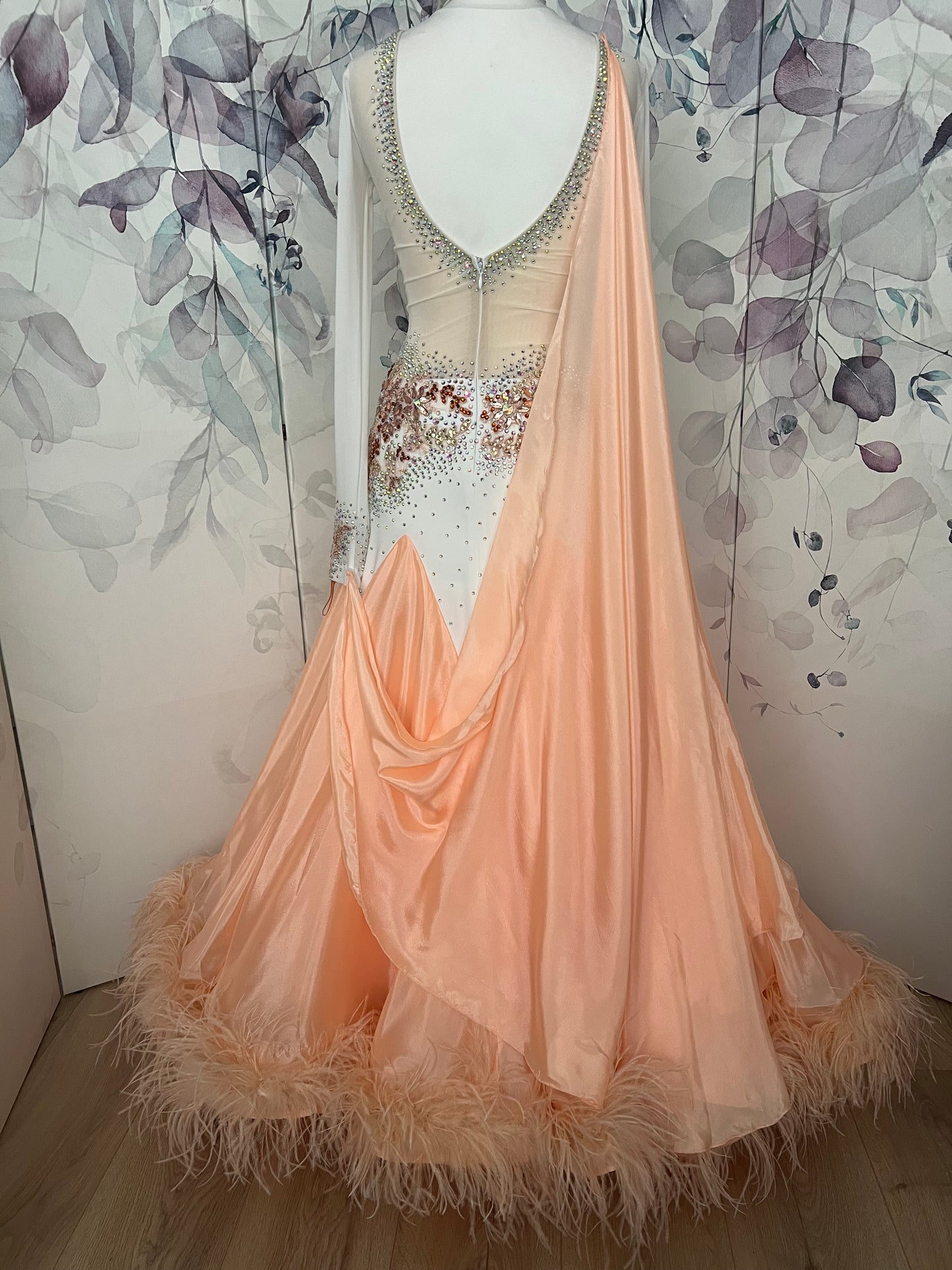 227 Peach & White Ballroom Dress with peach ostrich feather boa attached to the hem. Stoned in light peach, AB & Topaz. Detachable Float detail to the right back shoulder to left sleeve