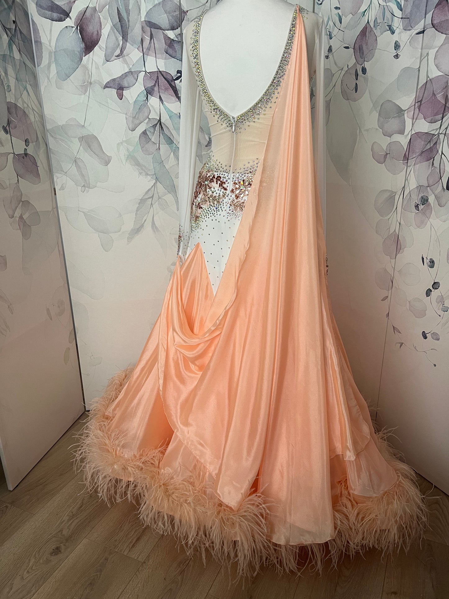 227 Peach & White Ballroom Dress with peach ostrich feather boa attached to the hem. Stoned in light peach, AB & Topaz. Detachable Float detail to the right back shoulder to left sleeve
