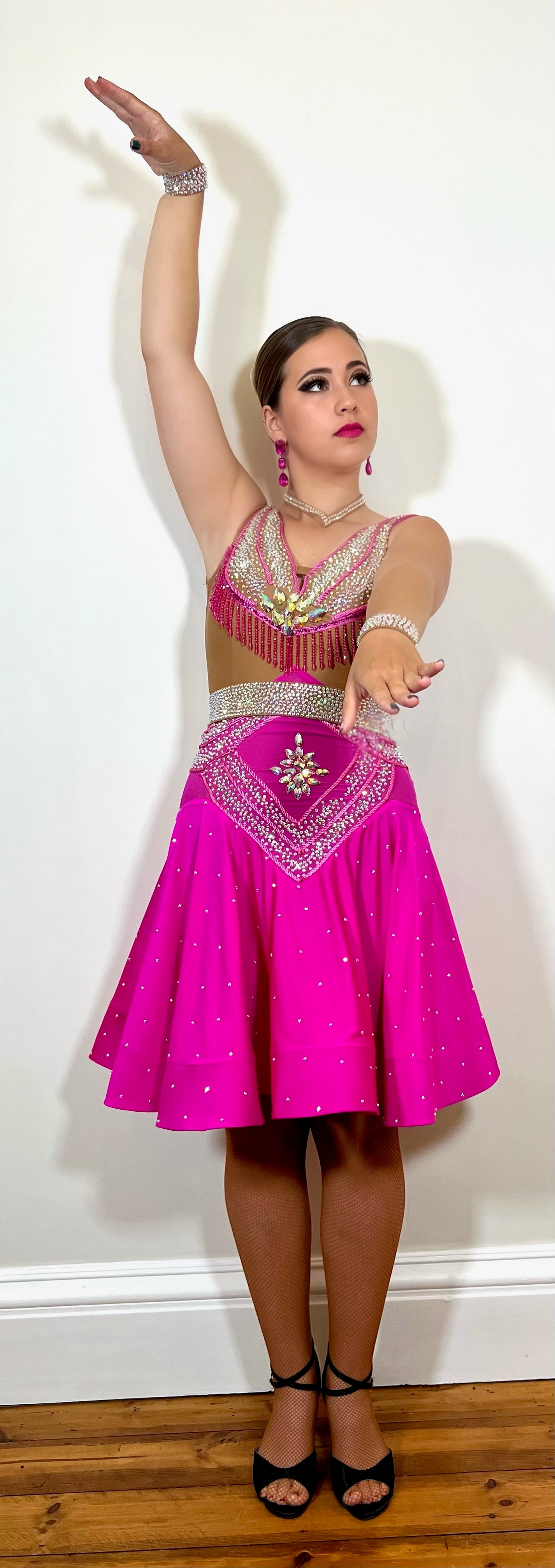 213 Cerise Pink & Tan Full skirted Latin dress with cerise bead dropper trim. Decorated with AB stones