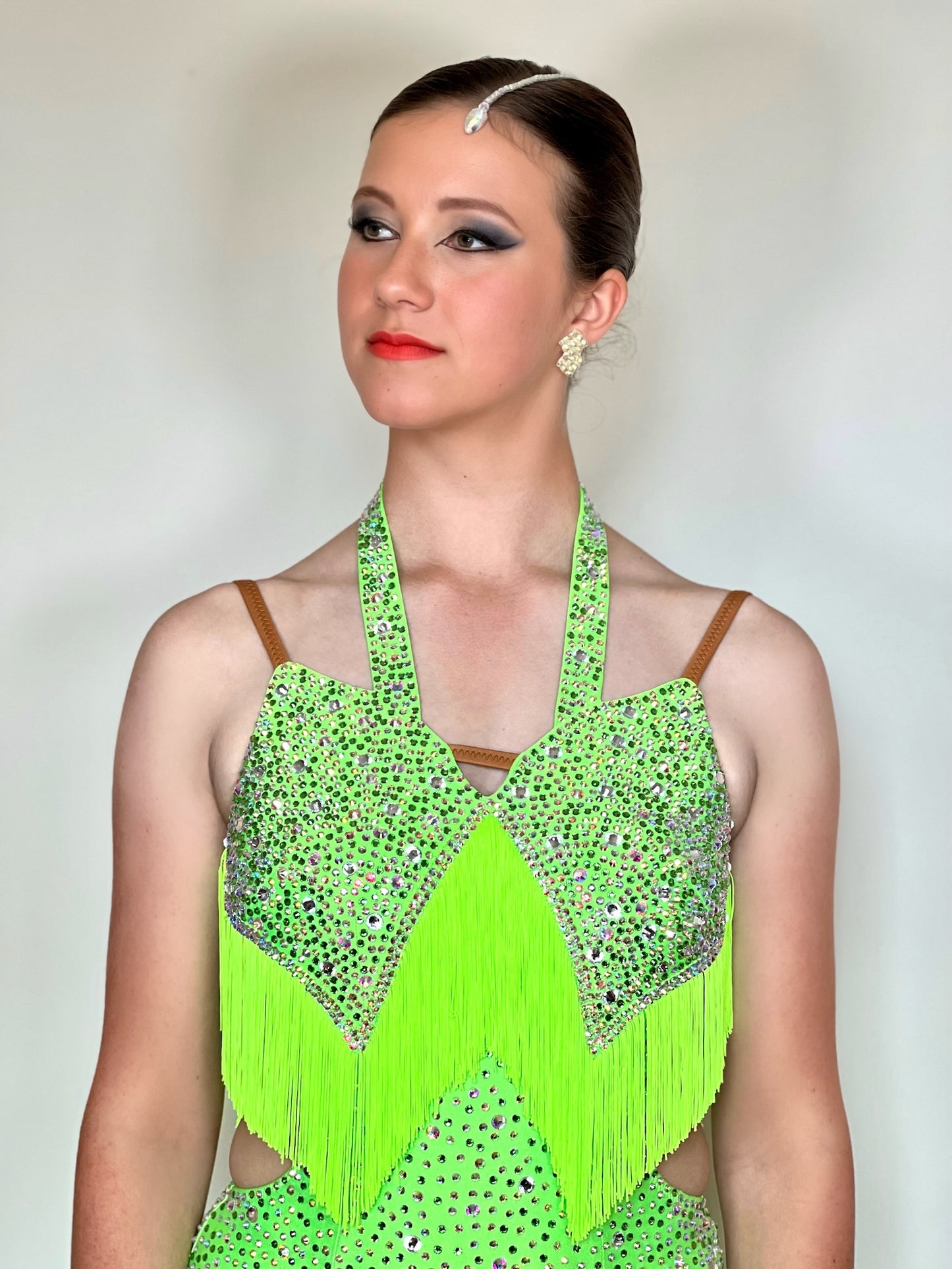 176 Flo Green Latin dress with fringe detailing. Stones are green & AB