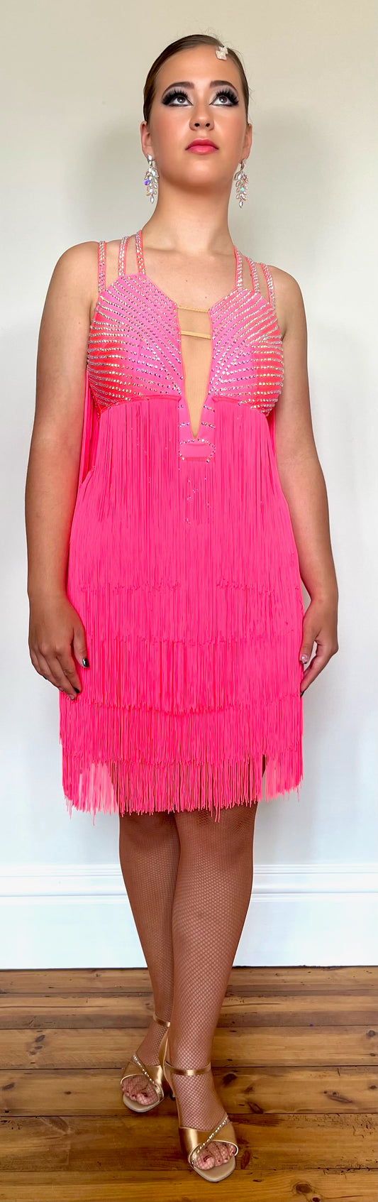237 Bright Coral Fringed Dress. Decorated in AB stones with strapping detail to the shoulders & back. Matching Skirt, Floats & Belt available on request £135 extra