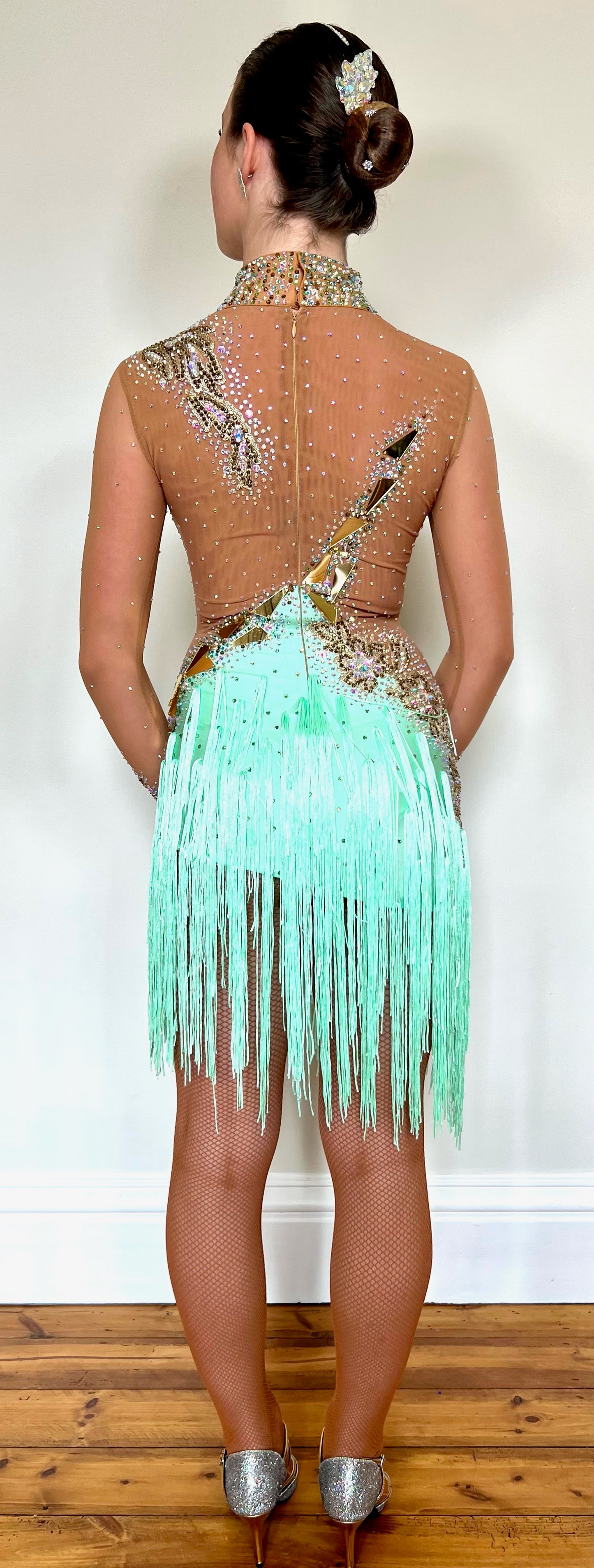 190 Tan mesh & mint Green High back Latin dress. Decorated with gold mirrors & AB stones.