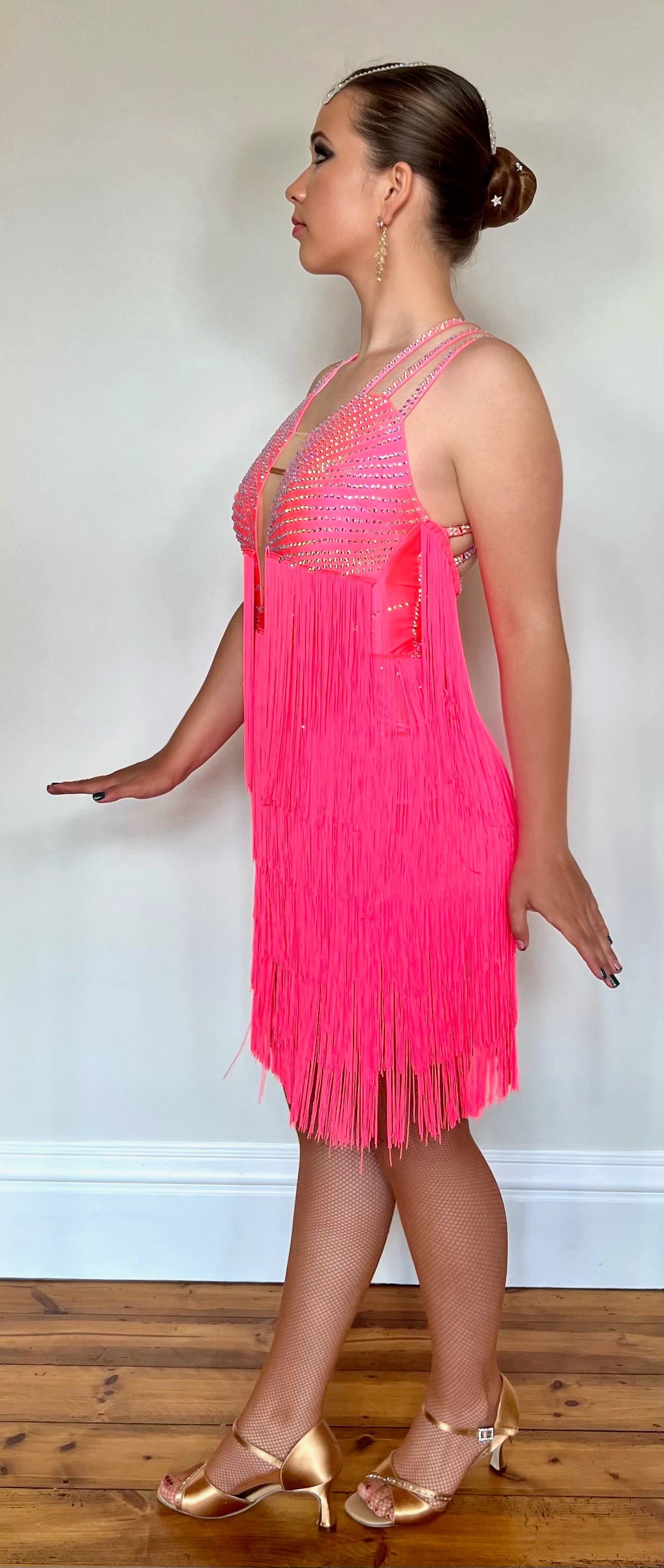 237 Bright Coral Fringed Dress. Decorated in AB stones with strapping detail to the shoulders & back. Matching Skirt, Floats & Belt available on request £135 extra
