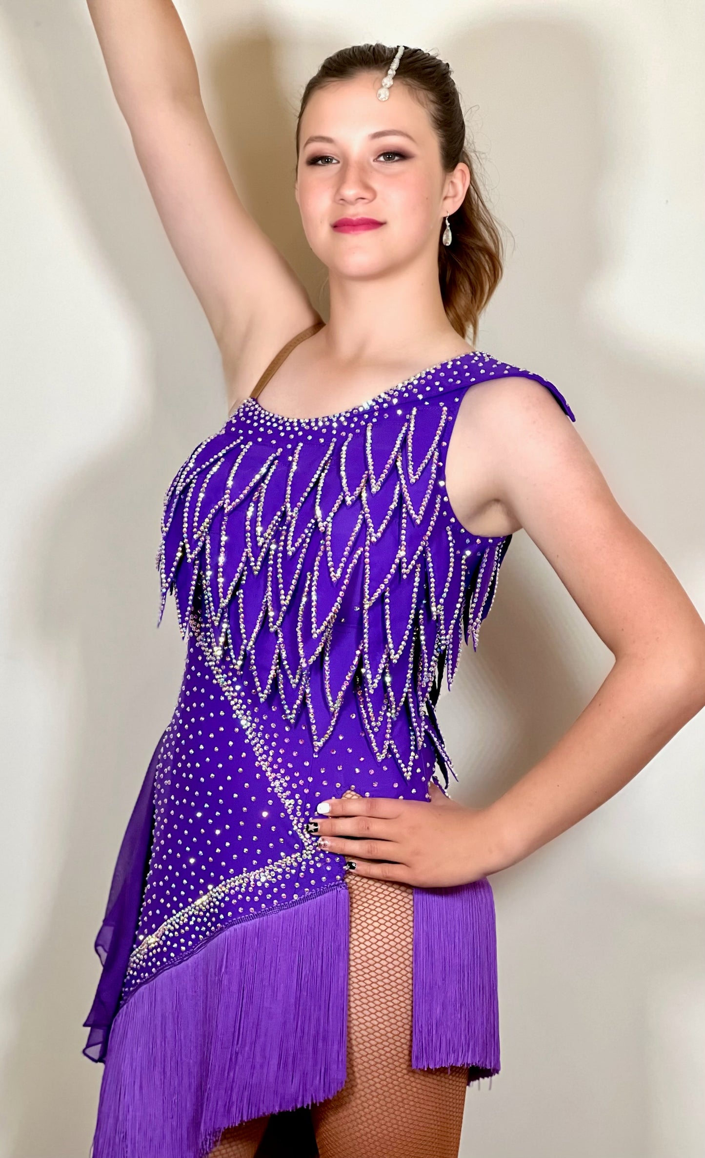205 Cadbury Purple Stoned leaf design bodice Latin Dress. Flattering design with short fringed skirt. Decorated in AB stones